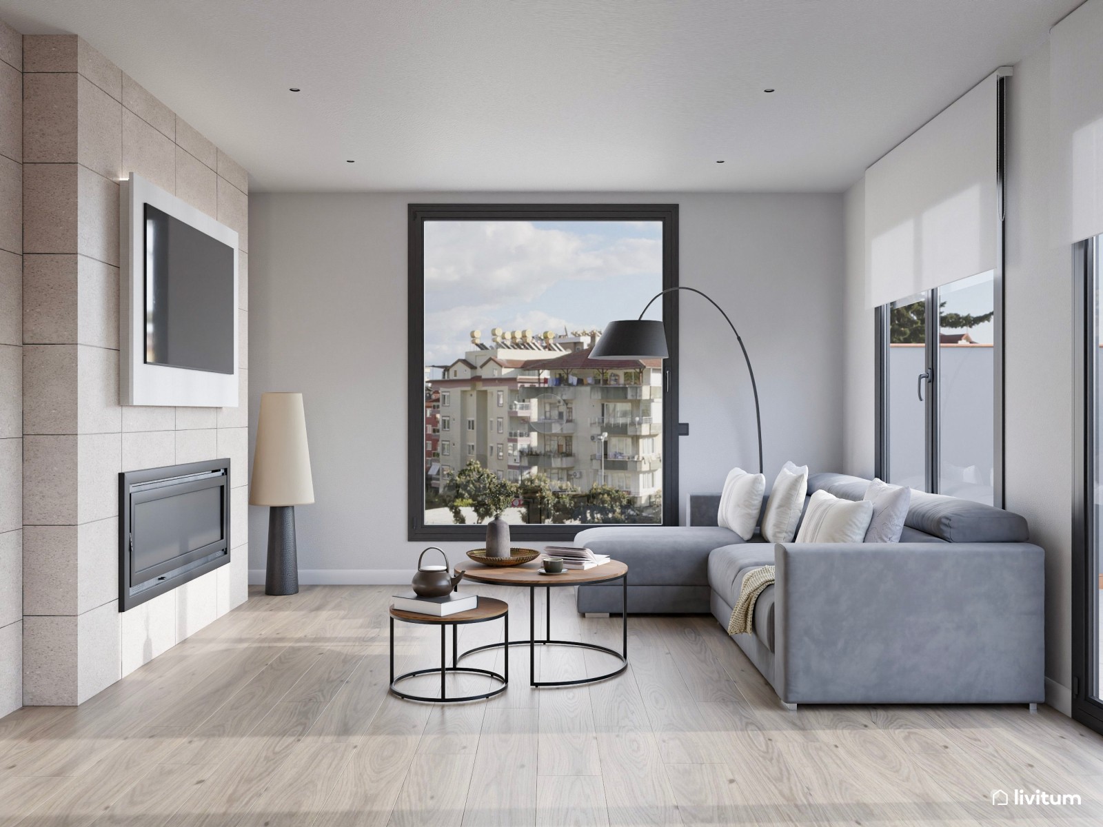 Moderno salón comedor con chimenea en tonos grises y detalles negros