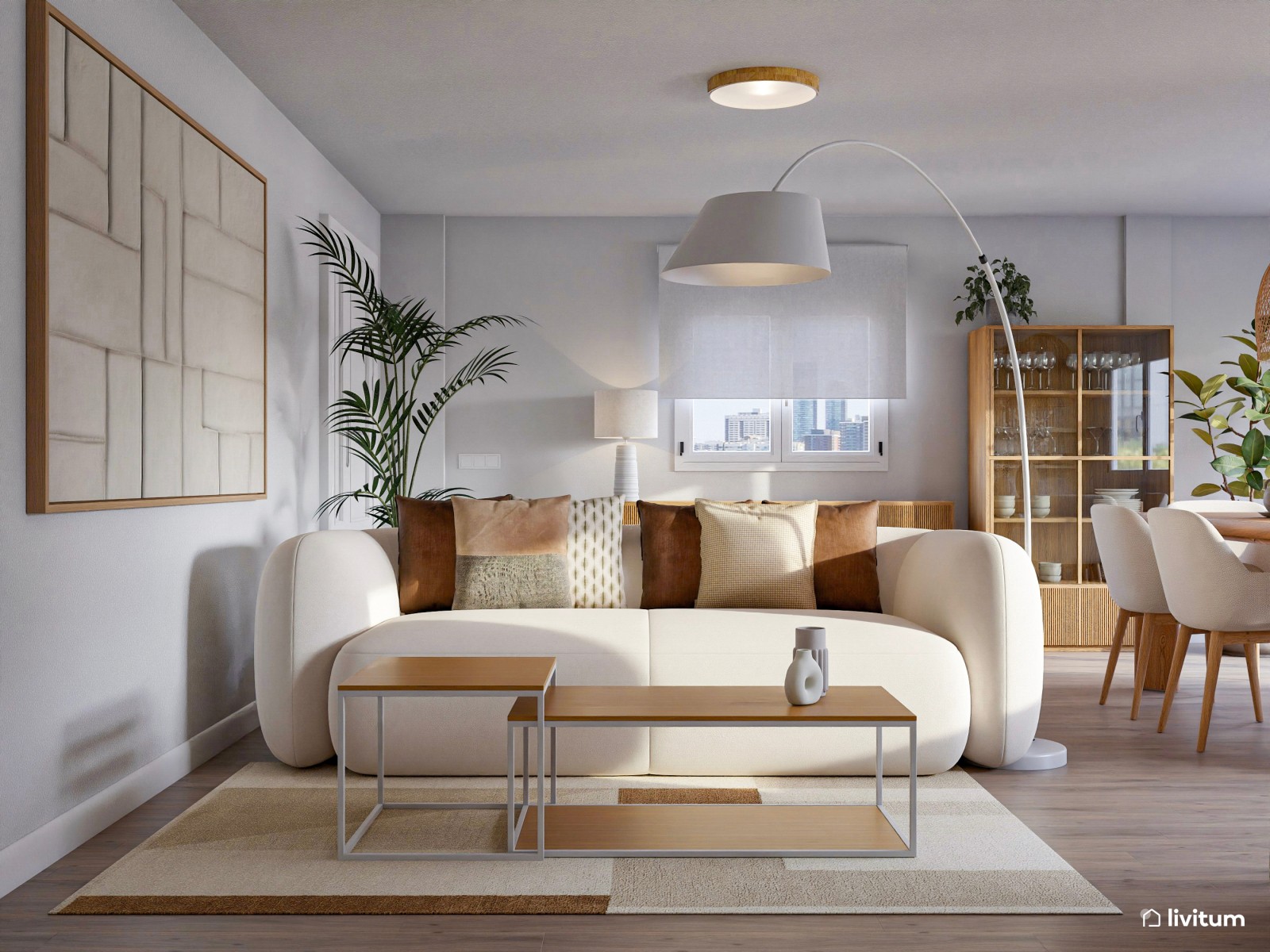 Papel pintado, toques de beige y luz natural dan vida a este acogedor salón