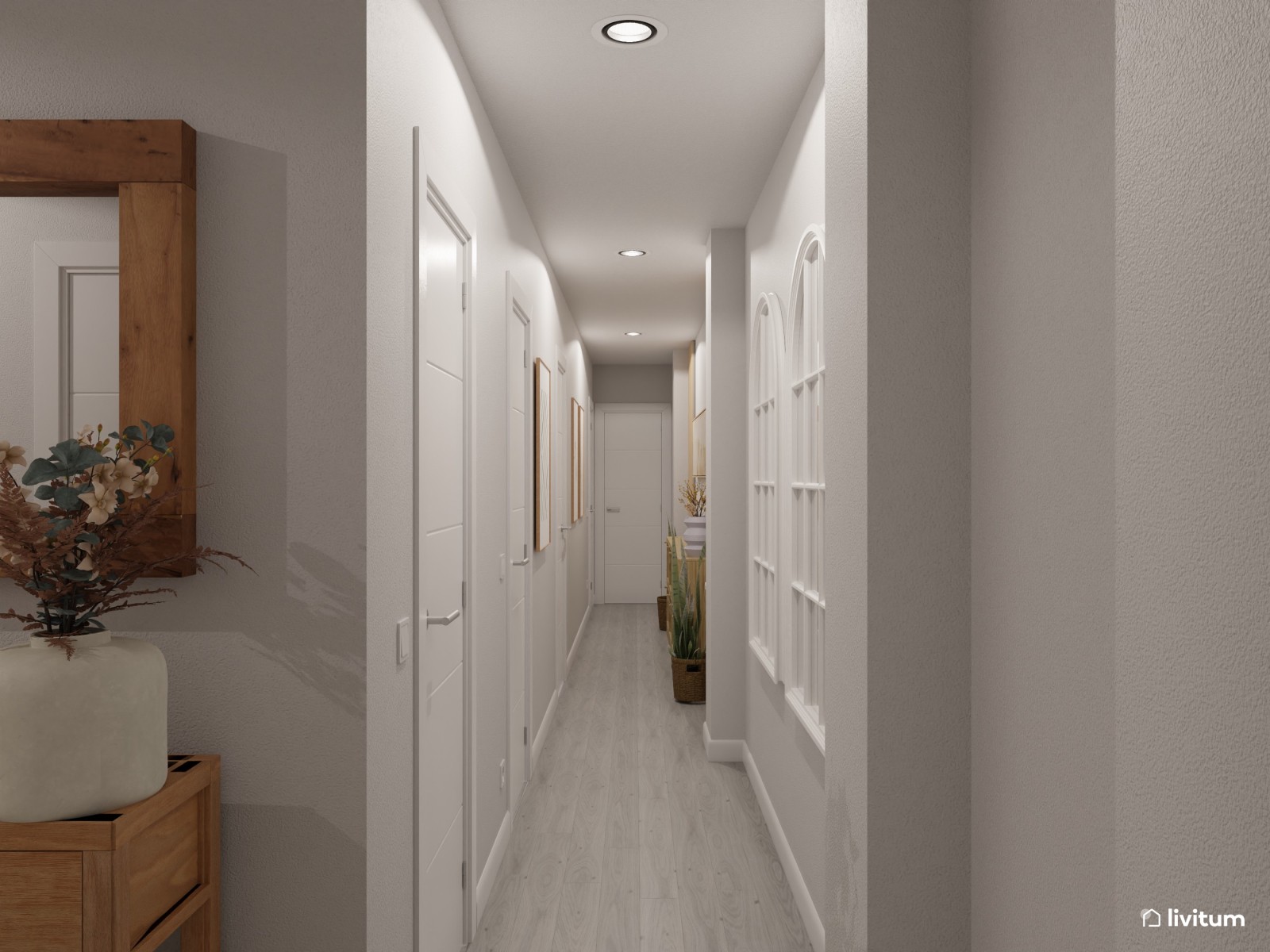 Pasillo estrecho y alargado con sutil y elegante decoración