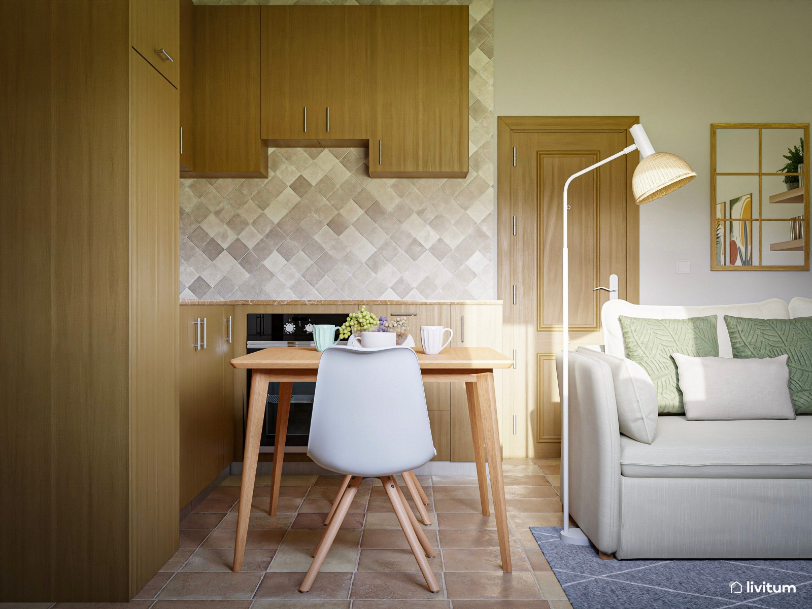 Pequeño salón comedor con cocina y espacio de trabajo 