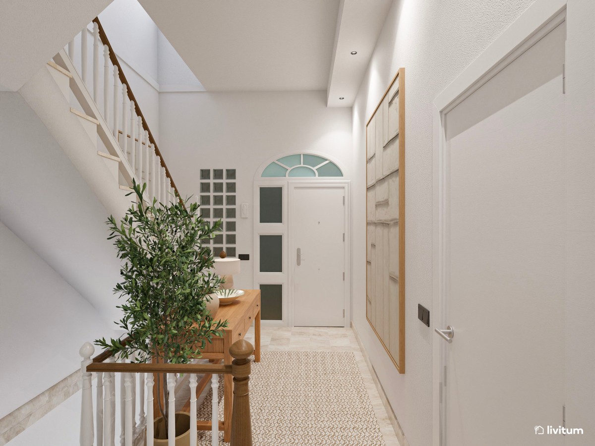 Recibidor acogedor de estilo minimalista situado entre escaleras