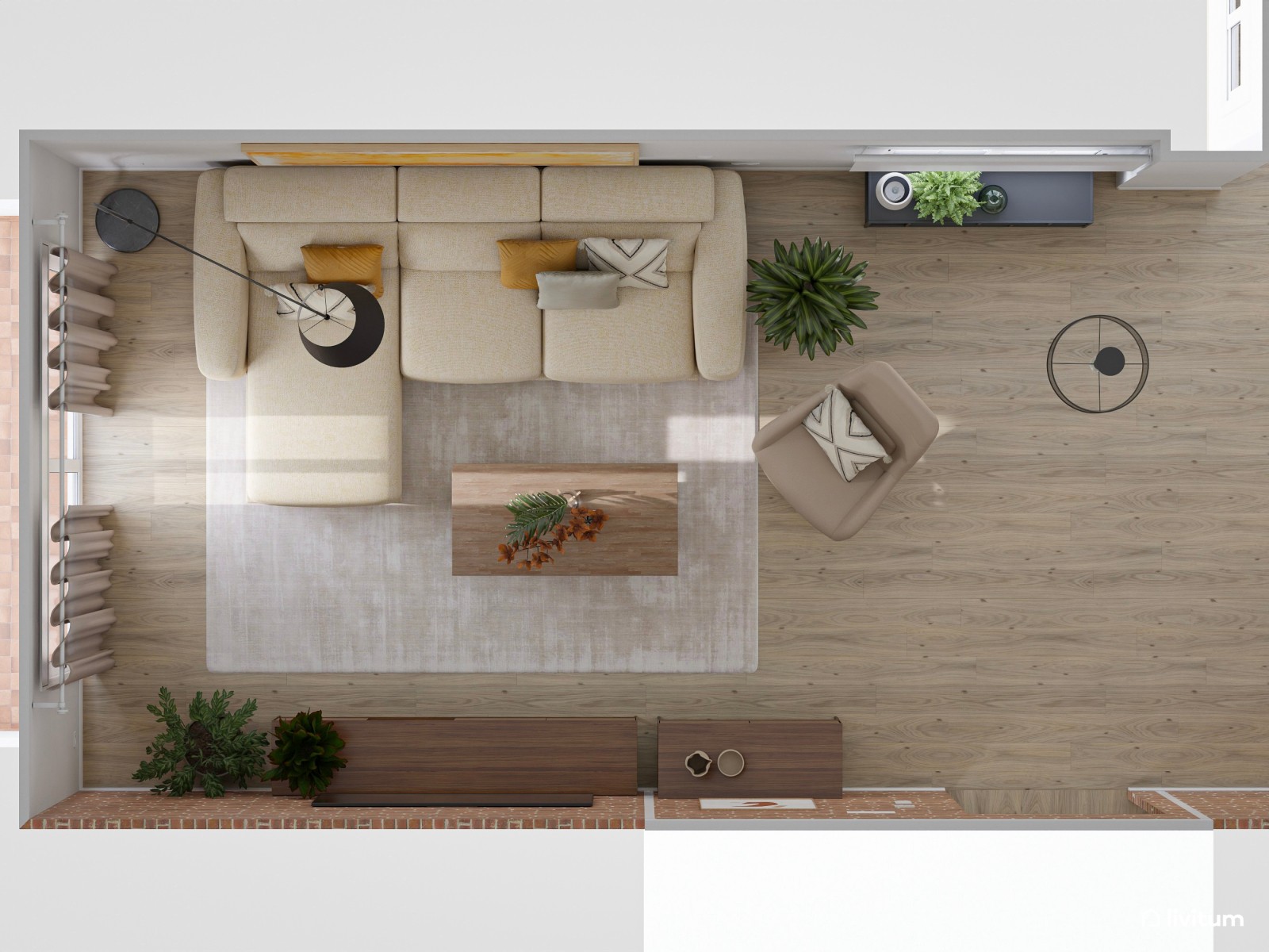 Salón abierto de estilo industrial con pared de ladrillos vistos