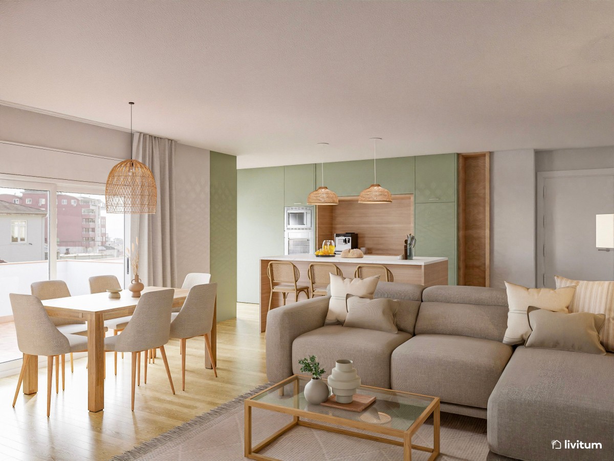 Salón comedor con bonita cocina abierta en verde