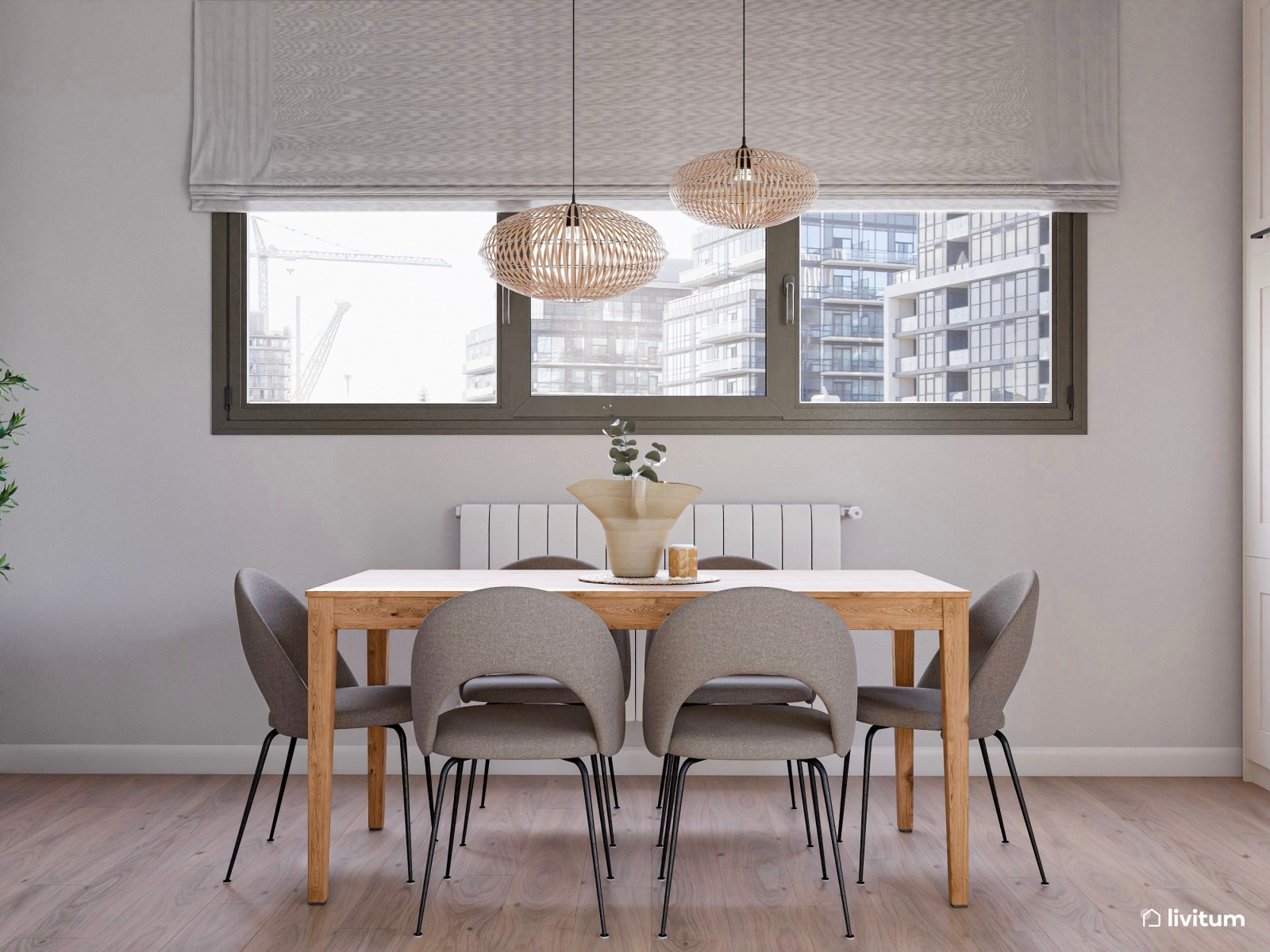 Salón comedor con cocina abierta con divertida pared repleta de cuadros