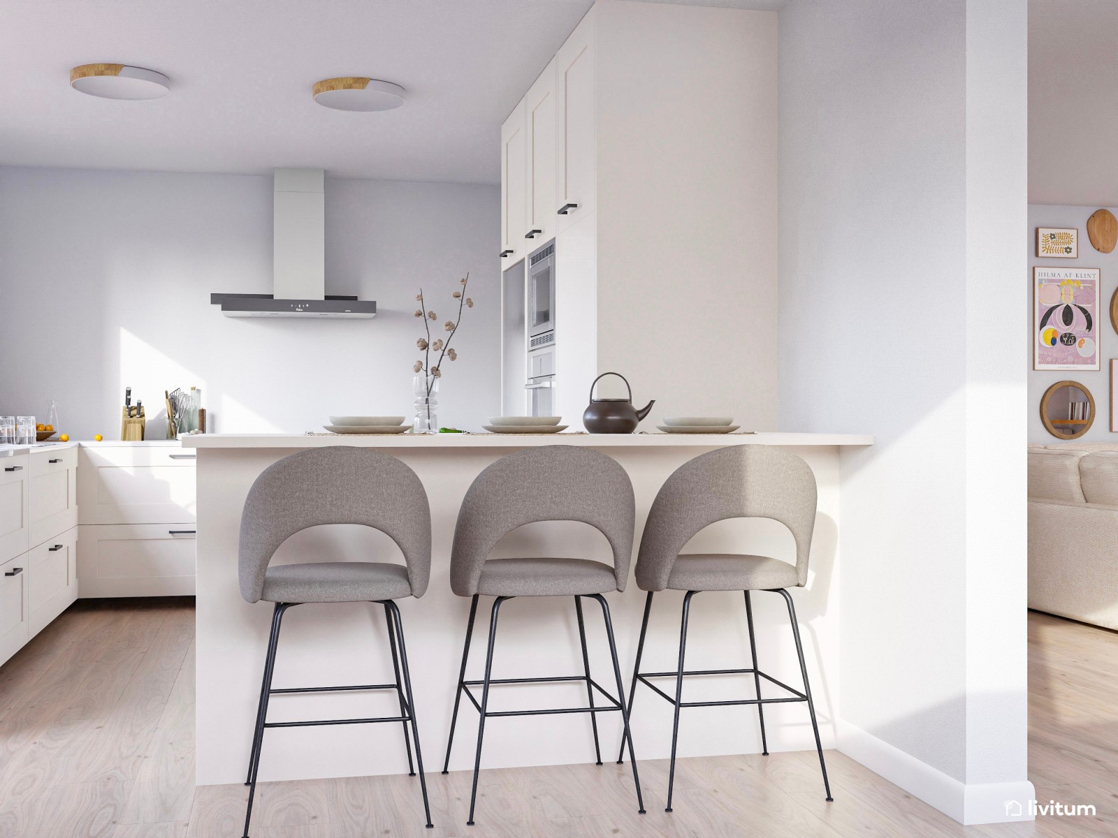 Salón comedor con cocina abierta con divertida pared repleta de cuadros