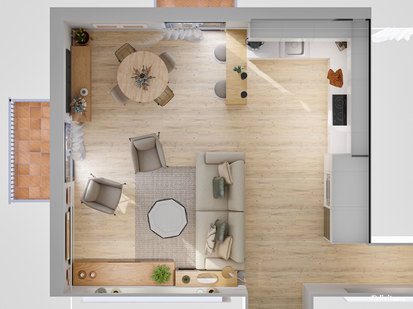 Salón comedor con cocina abierta con pequeño rincón de ladrillos vistos