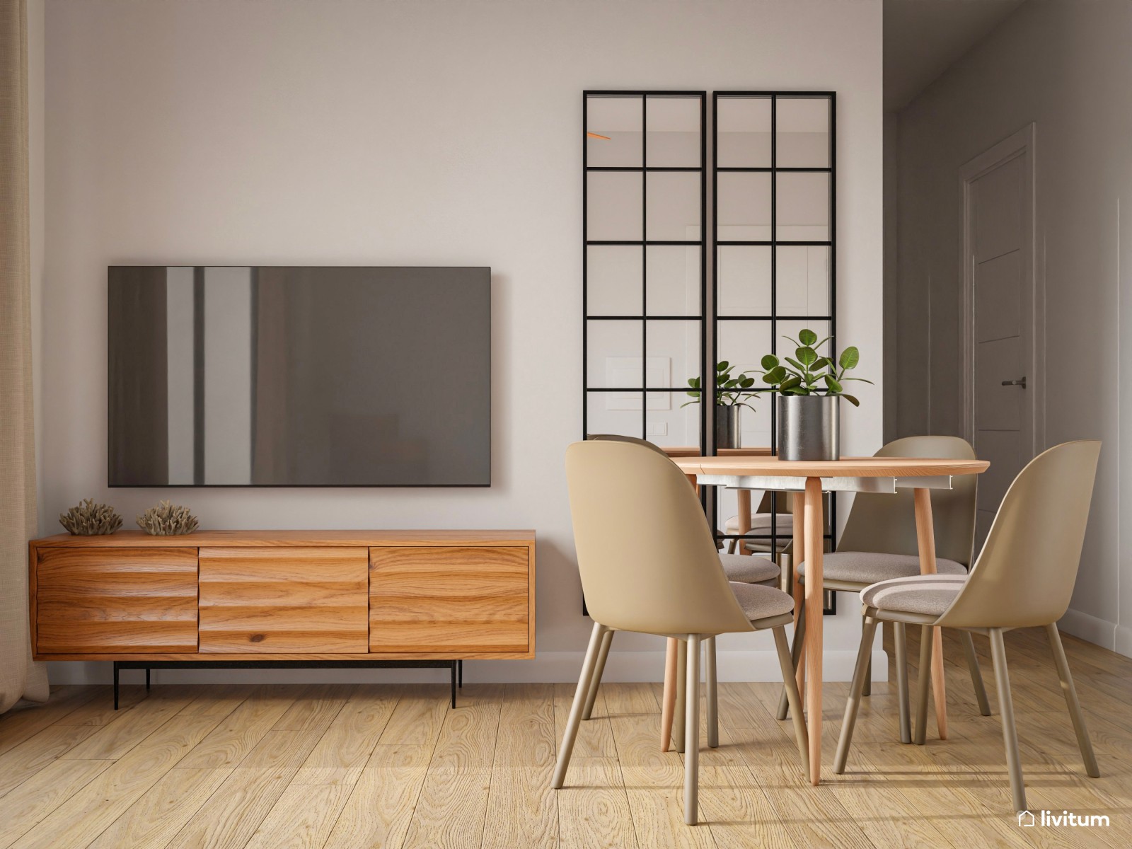 Una cocina con una mesa y sillas y un televisor montado en la pared.