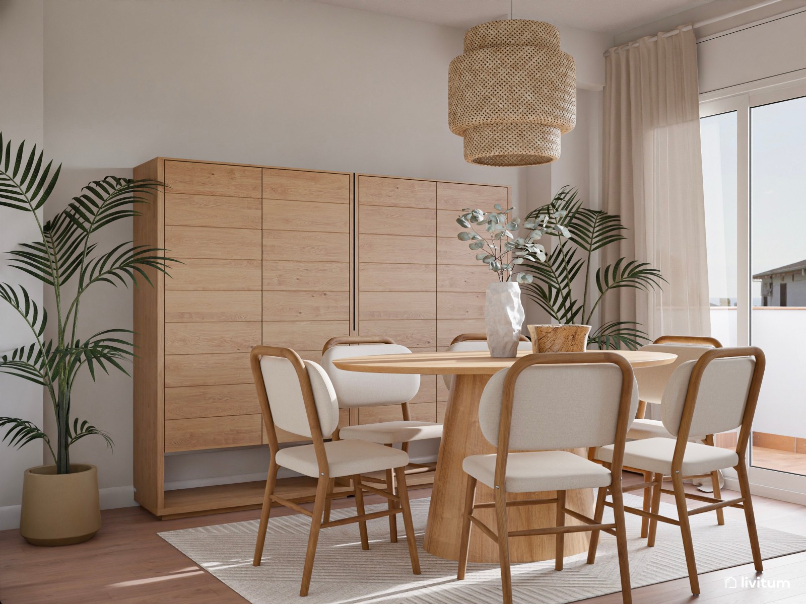 Salón comedor con cocina abierta de tonos suaves y detalles en negro