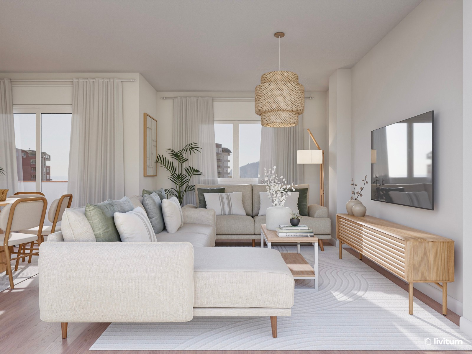 Salón comedor con cocina abierta de tonos suaves y detalles en negro