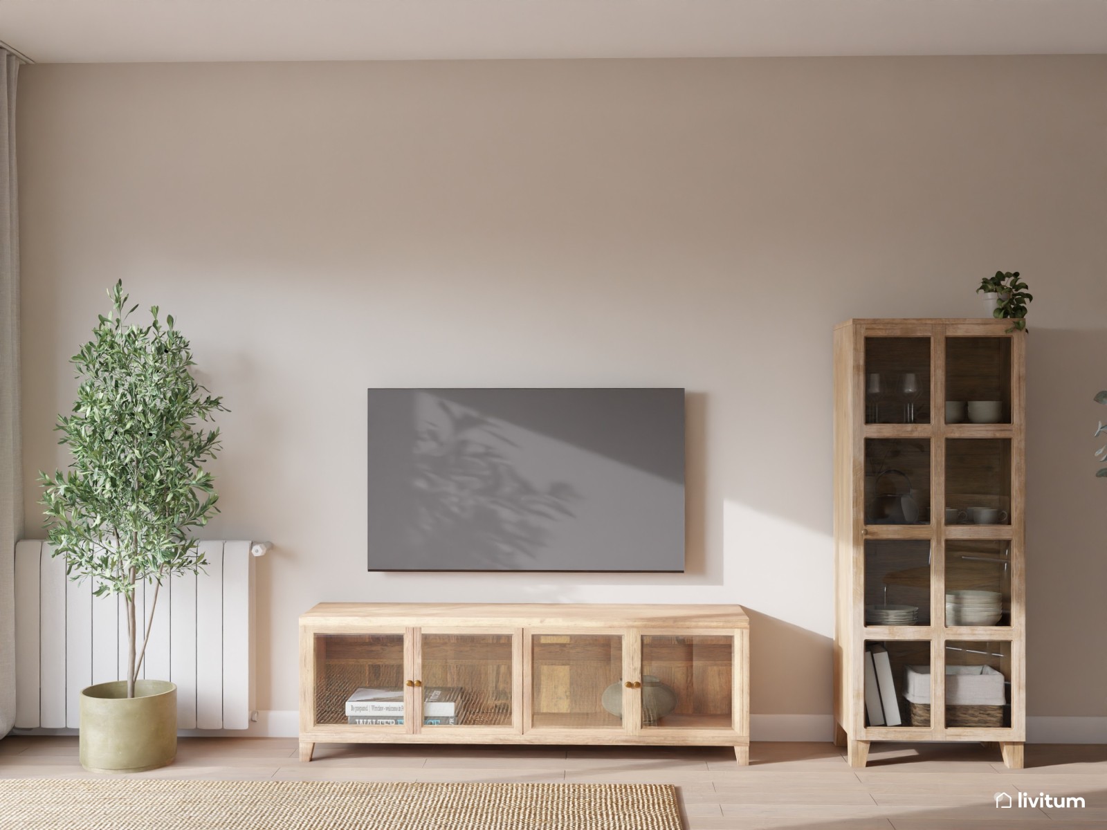 Salón comedor elegante en madera, fibras naturales y sofá de color verde 