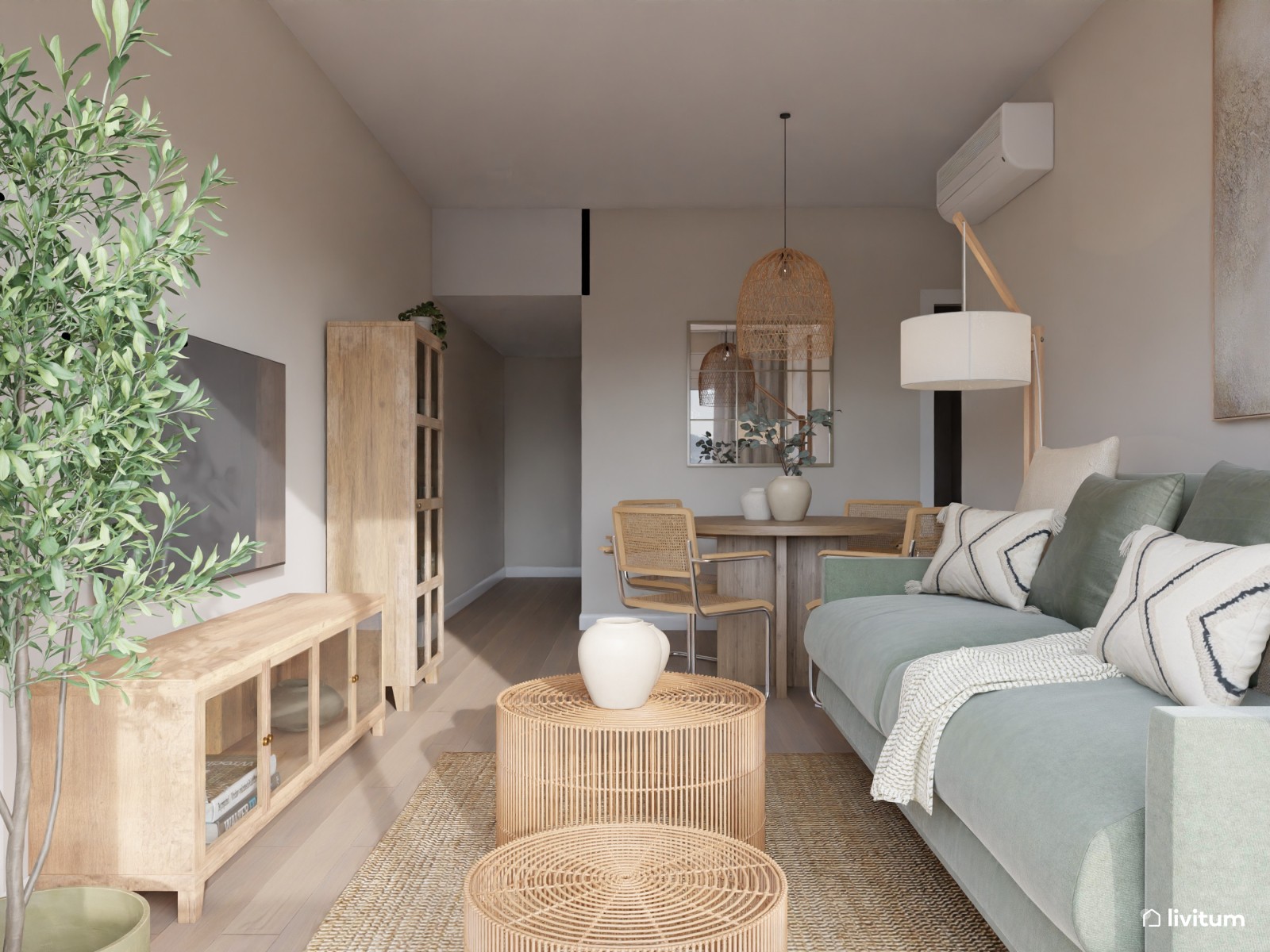 Salón comedor elegante en madera, fibras naturales y sofá de color verde 