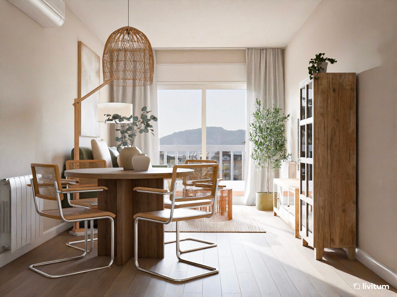 Salón comedor elegante en madera, fibras naturales y sofá de color verde 