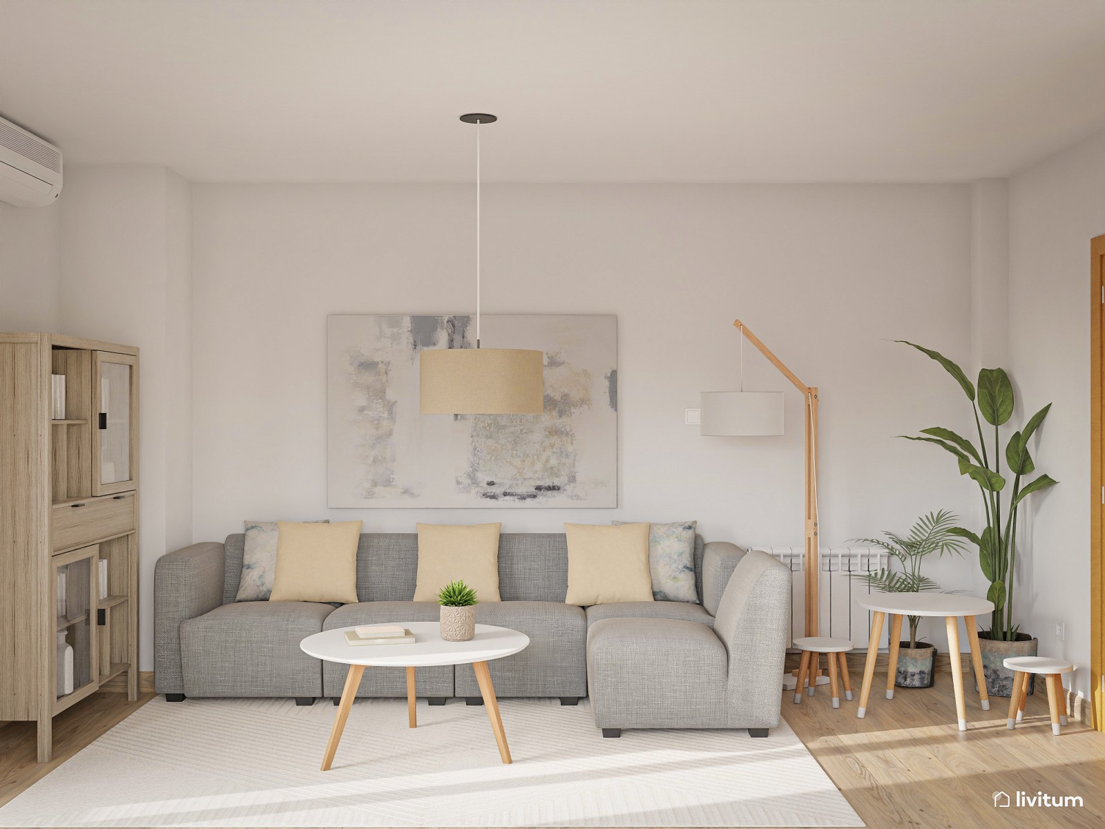 Salón comedor en tonos neutros con zona de juegos 