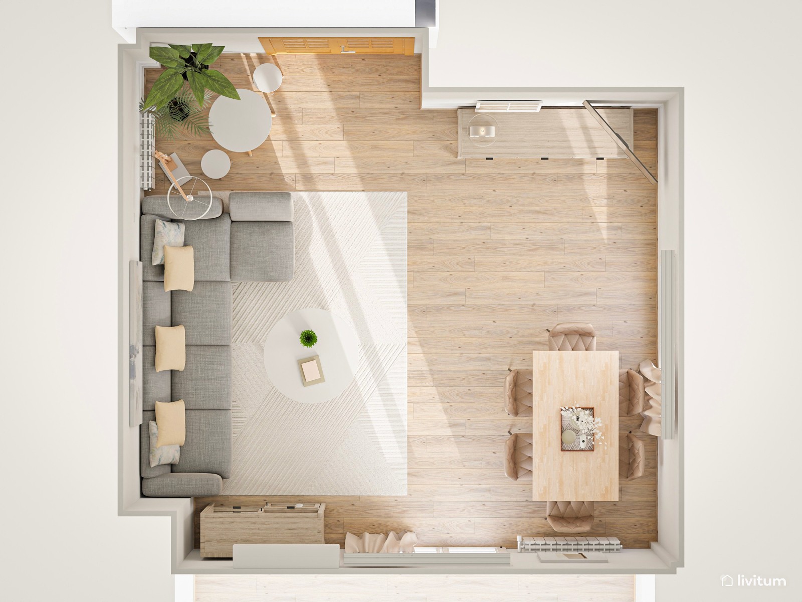 Salón comedor en tonos neutros con zona de juegos 