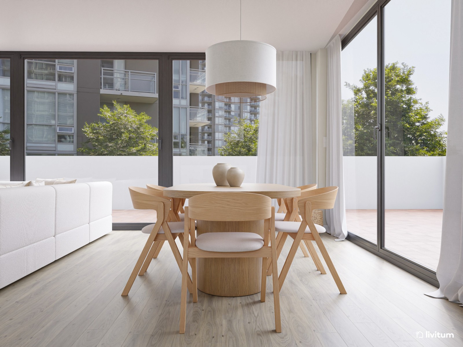 Salón comedor minimalista con amplio sofá rinconero