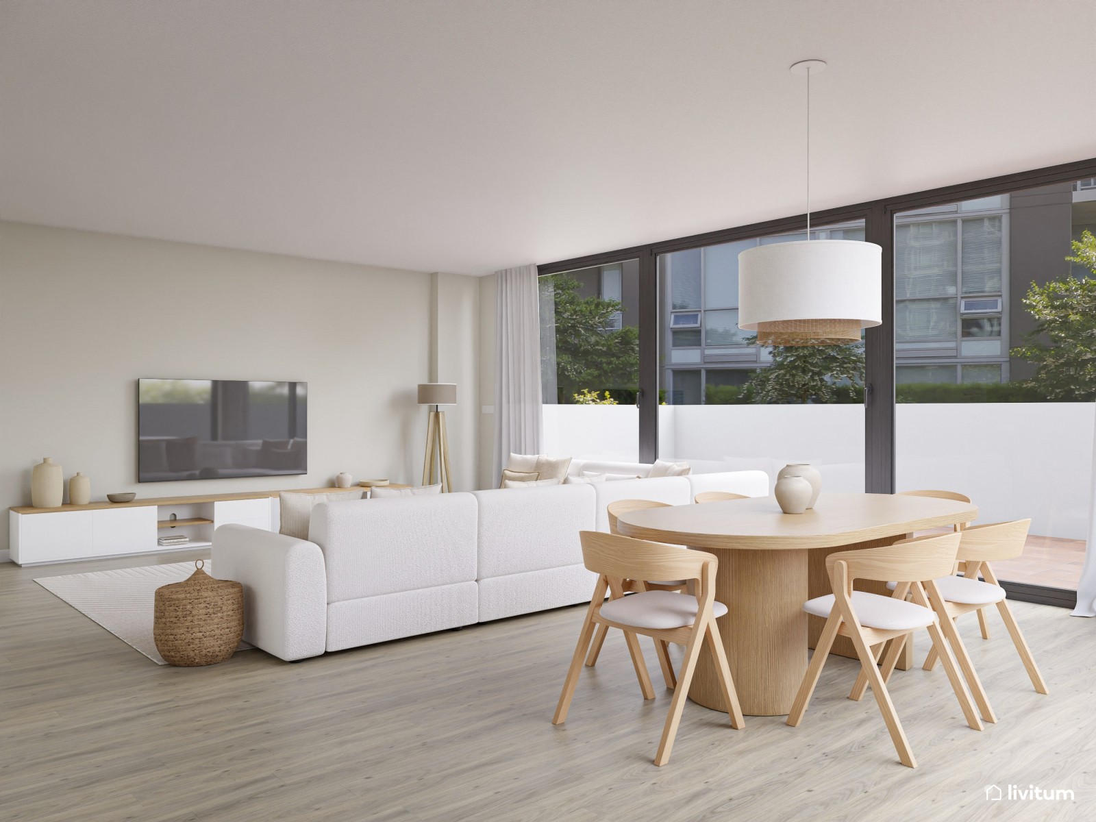 Salón comedor minimalista con amplio sofá rinconero