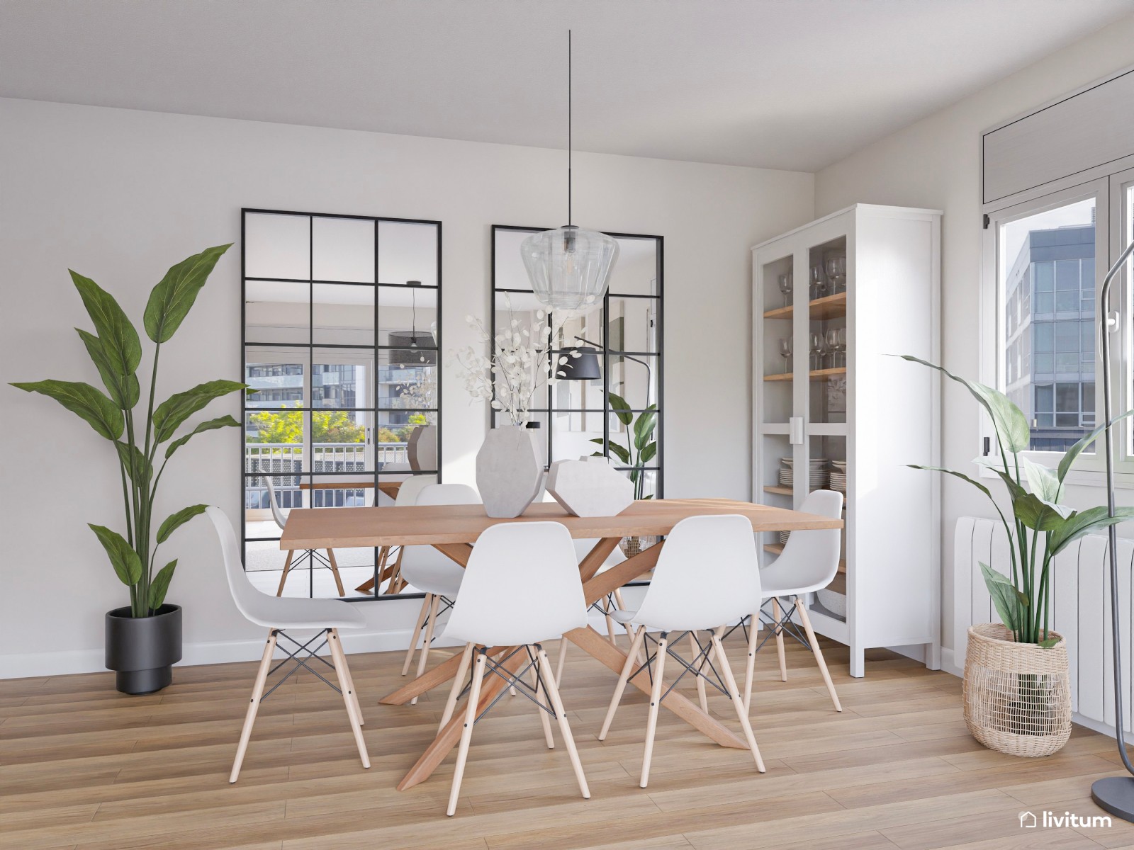 Salón comedor nórdico con pared en verde y detalles de acento en negro