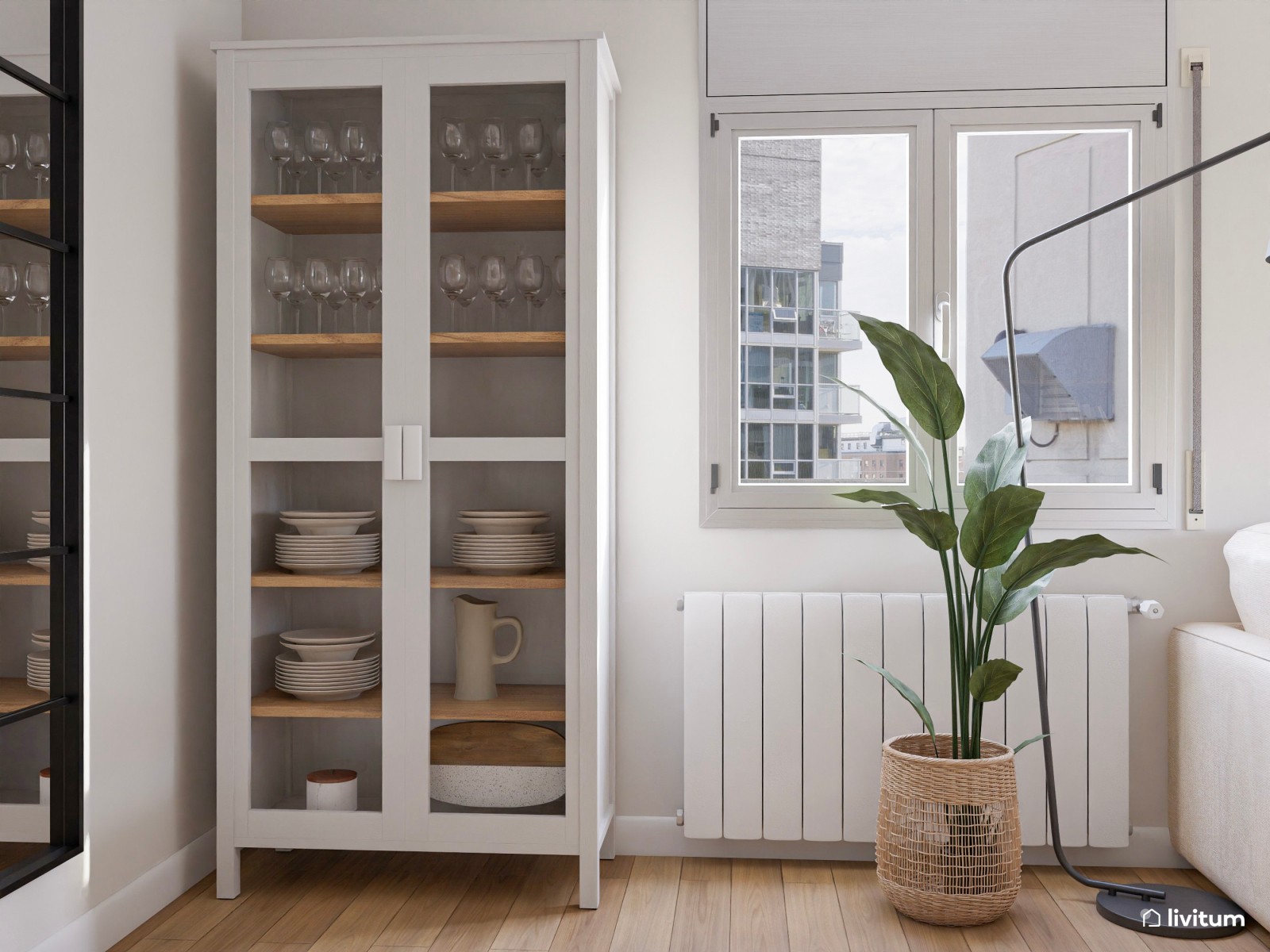 Salón comedor nórdico con pared en verde y detalles de acento en negro
