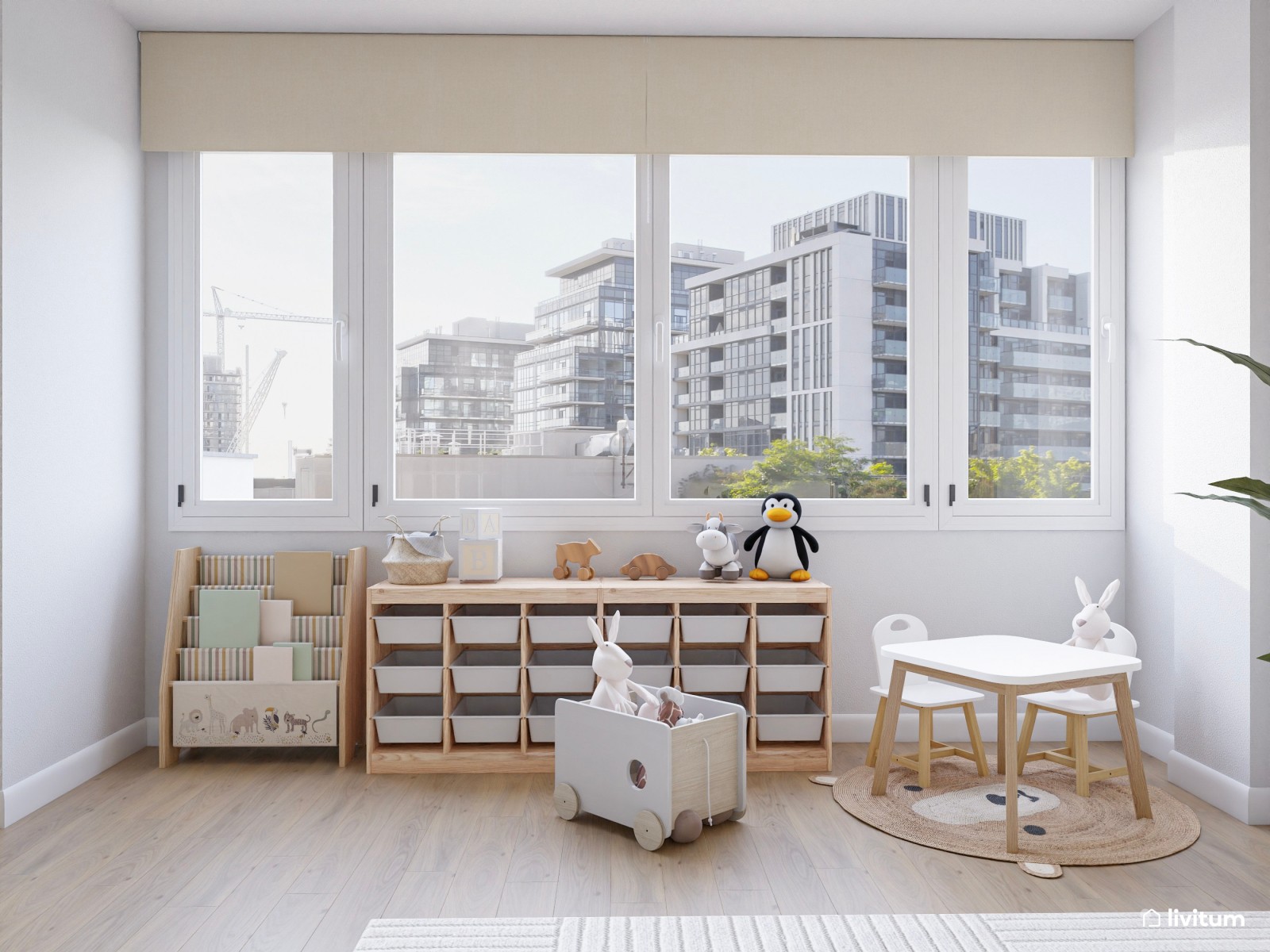 Salón comedor nórdico en tonos claros con zona de juego infantil