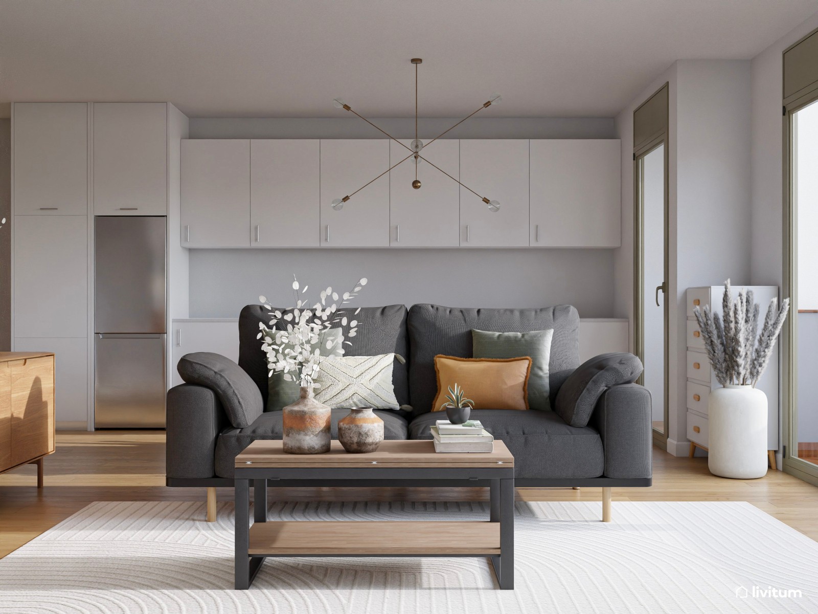 Salón contemporáneo con sofá gris oscuro y comedor en tonos suaves