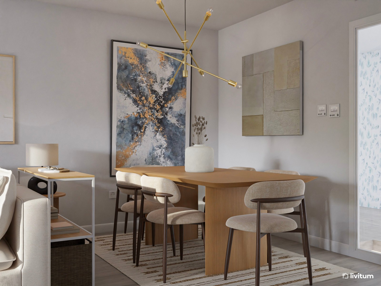 Salón decorado en tonos suaves con grandes y llamativos cuadros