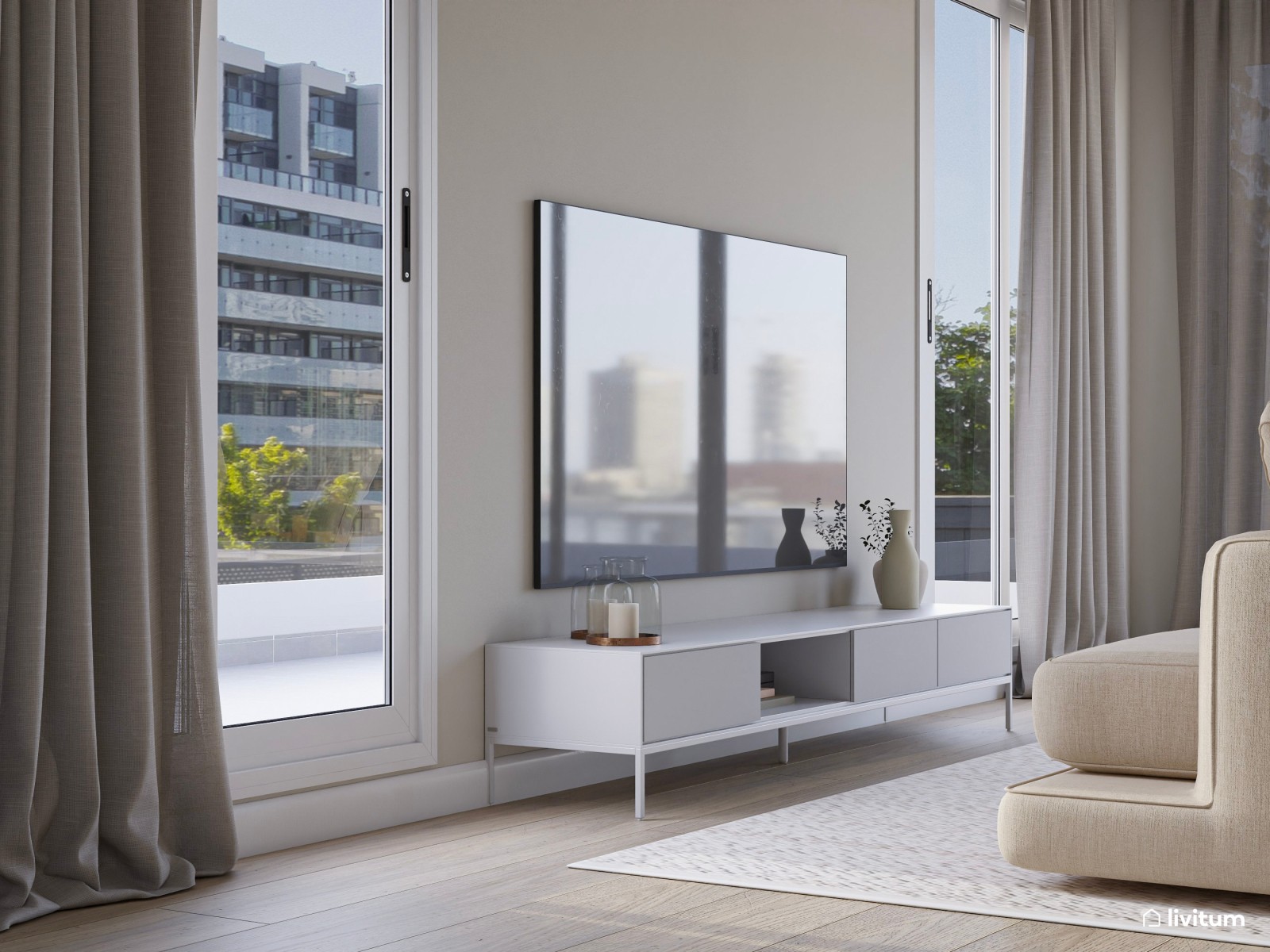 Salón elegante y amplio con mobiliario blanco, azul petróleo y acentos en negro
