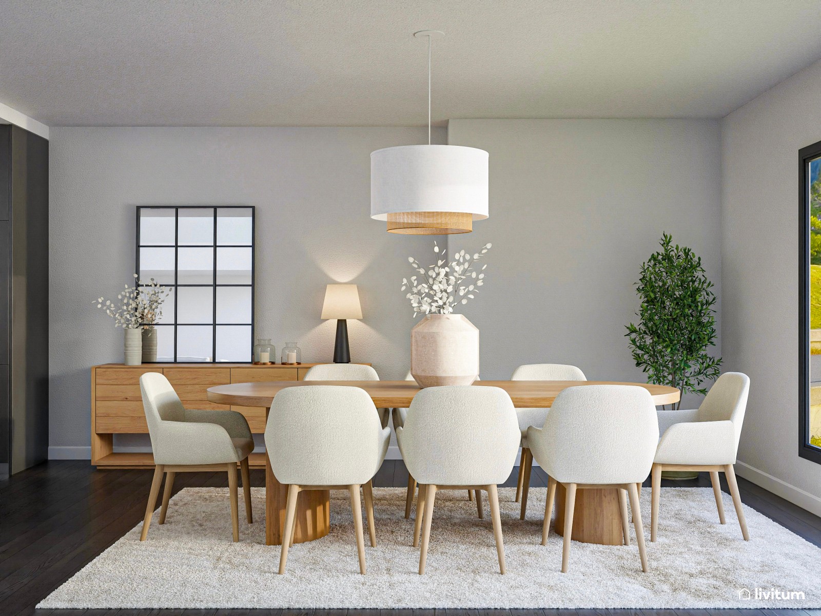 Salón minimalista amplio y decorado con textiles gustosos