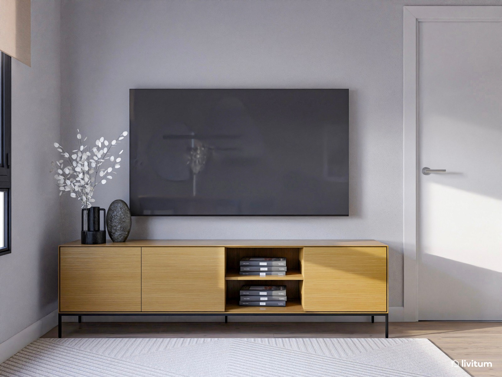 Salón moderno con acabados curvos, detalles oscuros y madera clara 