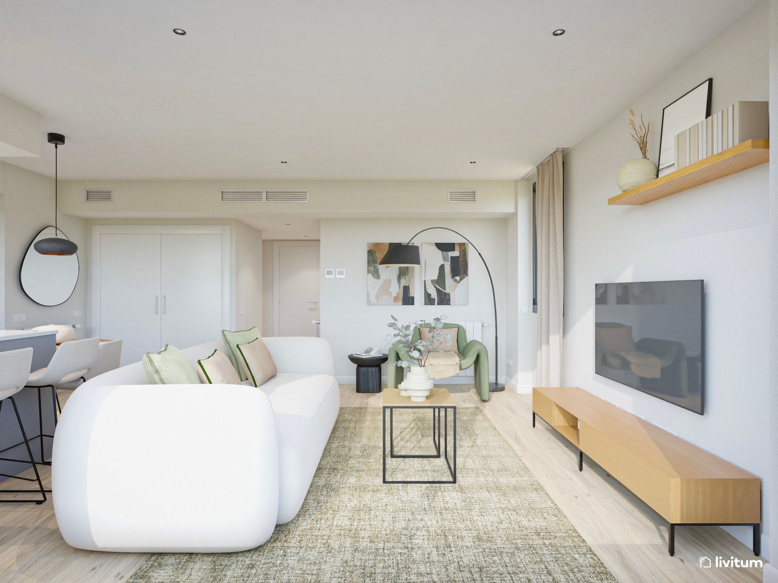 Salón moderno con sofá original de líneas curvas y butaca verde de diseño 