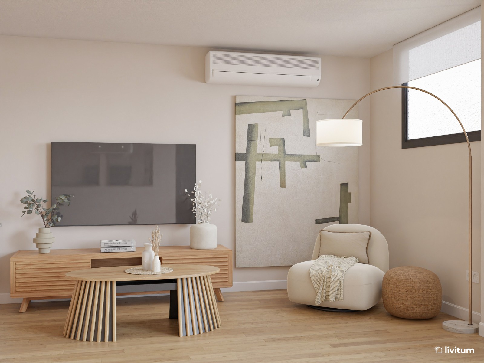 Salón nórdico cálido con gran sofá gris y muebles de madera clara