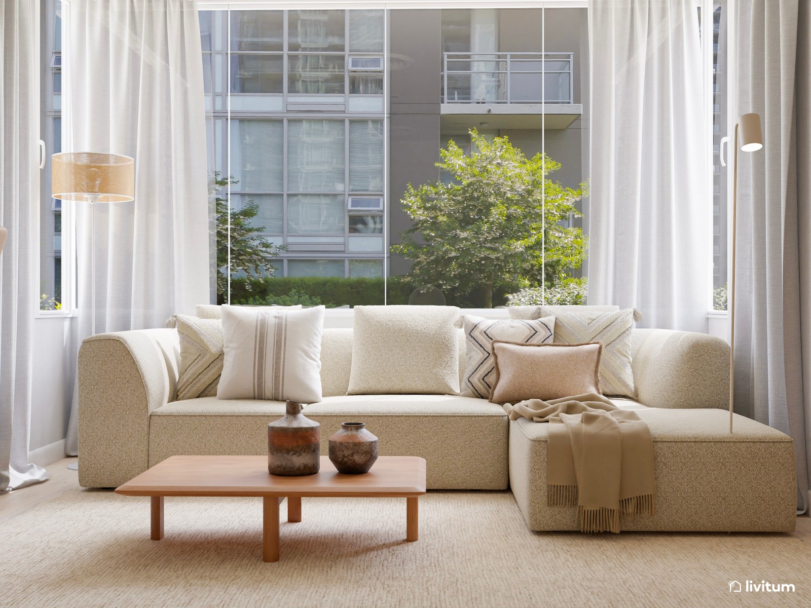 Salón nórdico minimalista con zona de teletrabajo, decorado en tonos crema