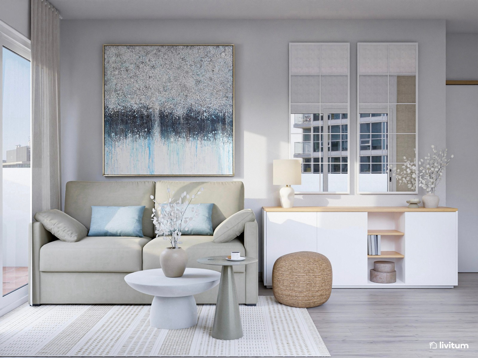 Salón pequeño y moderno con mesa redonda y grandes cuadros decorativos