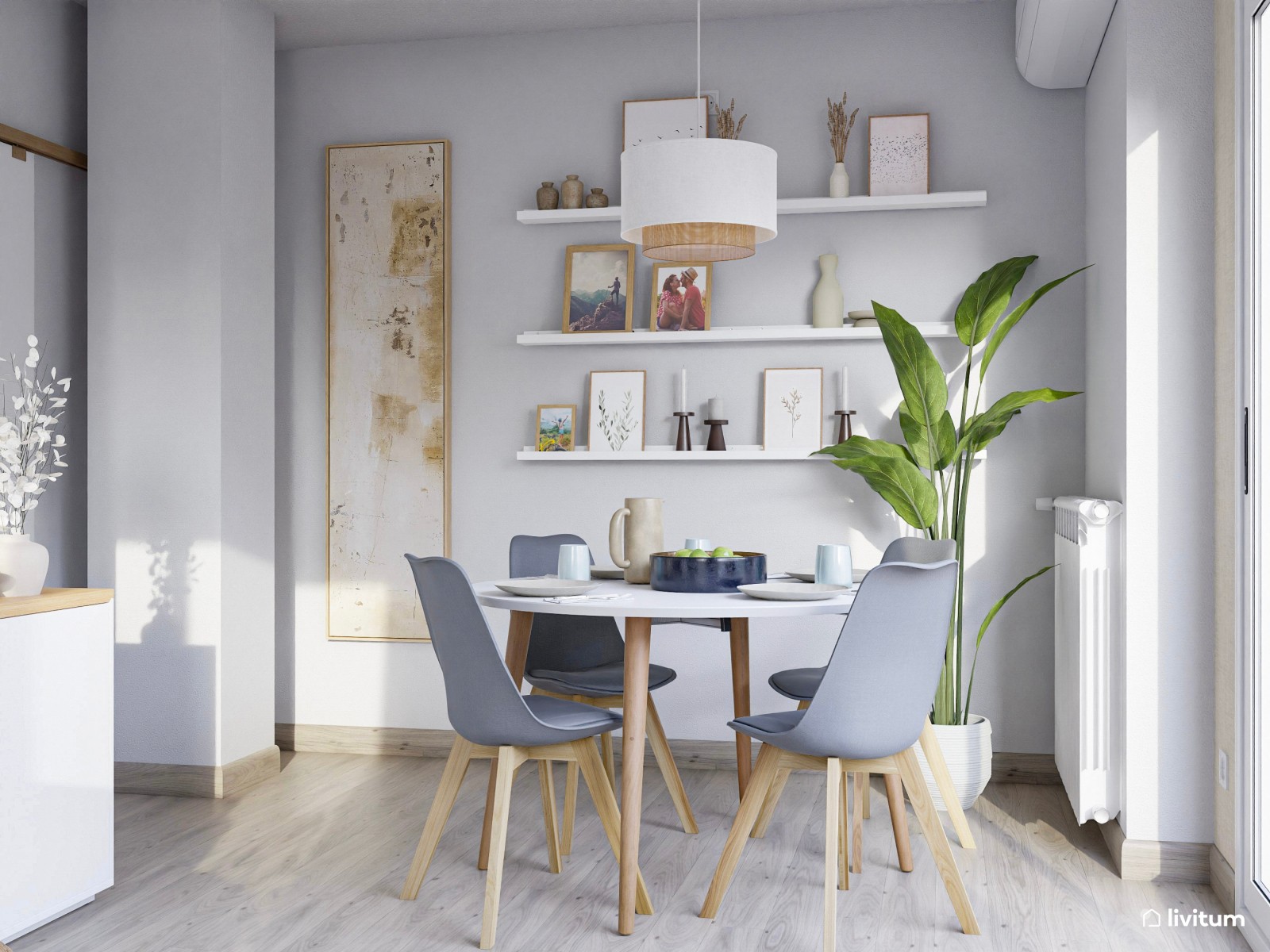 Salón pequeño y moderno con mesa redonda y grandes cuadros decorativos