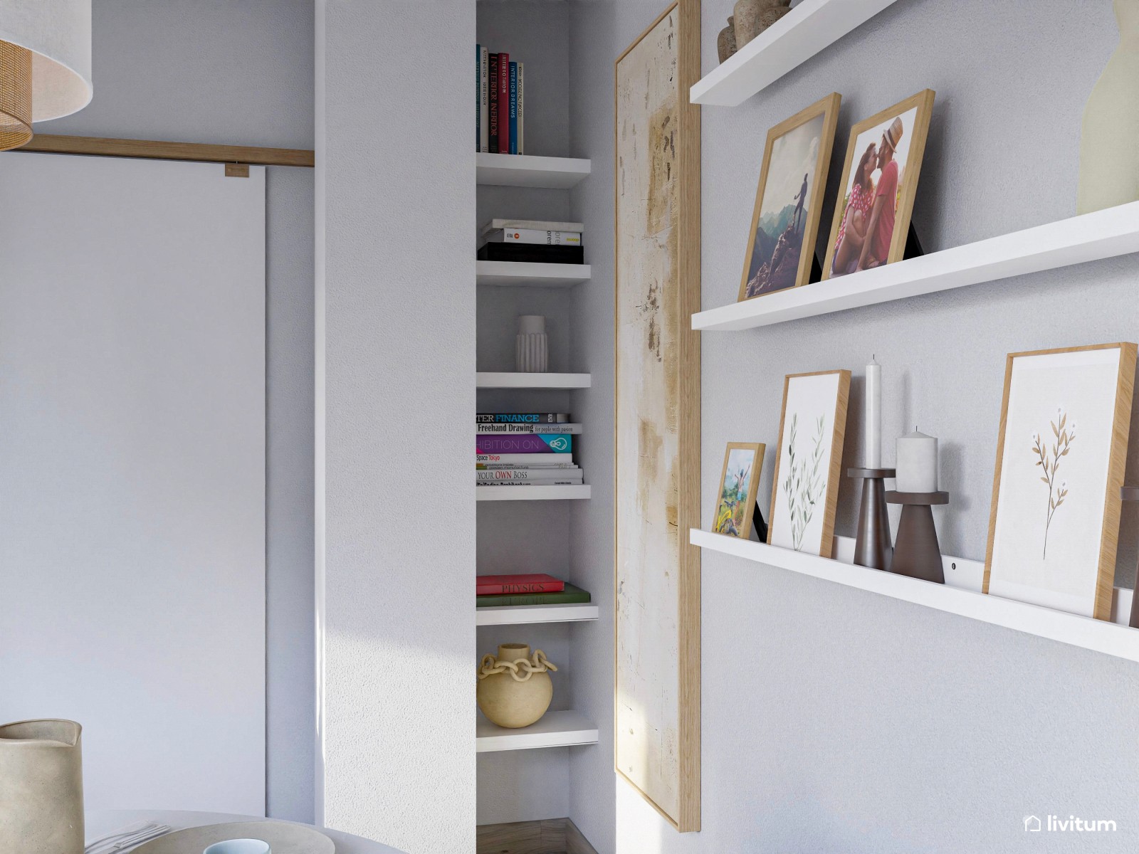 Salón pequeño y moderno con mesa redonda y grandes cuadros decorativos