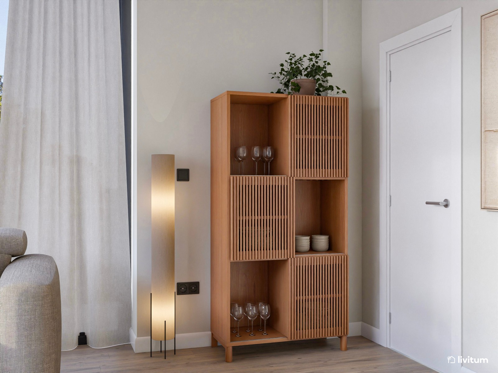 Salón sereno en tonos suaves, detalles en madera y cocina abierta