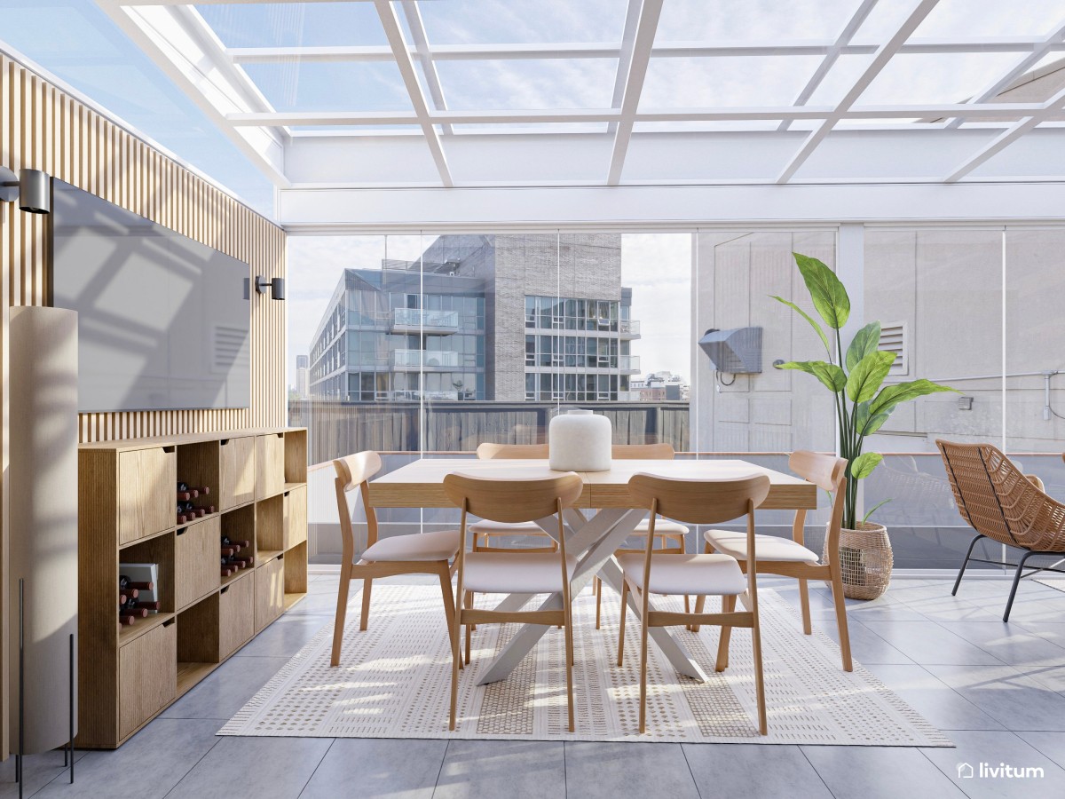 Terraza acristalada con zona de comedor y salón exterior