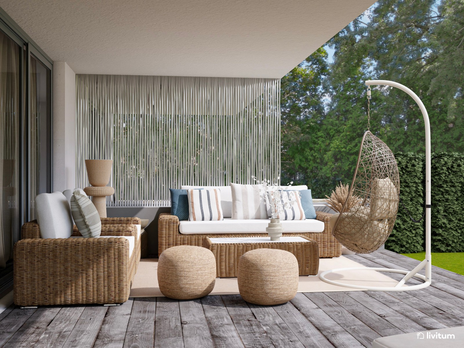 Terraza bohemia con muebles de ratán y cómodas tumbonas 