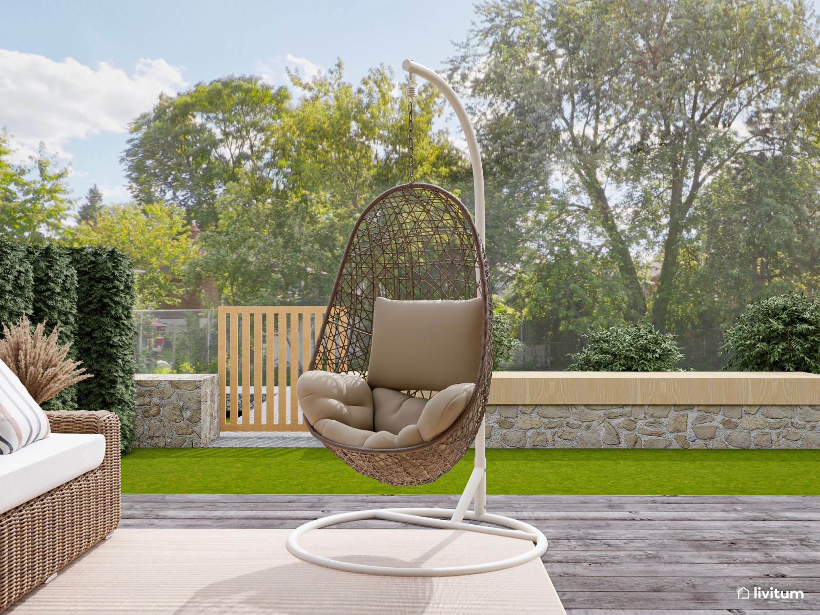 Terraza bohemia con muebles de ratán y cómodas tumbonas 