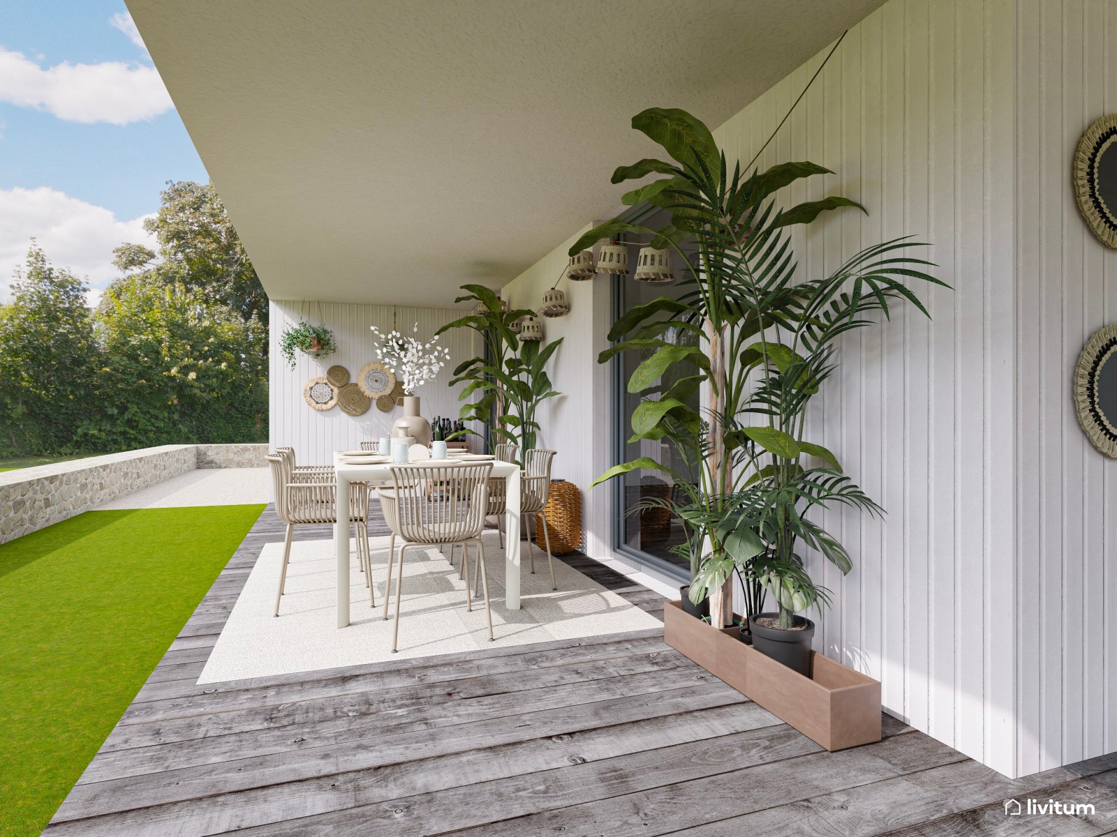 Terraza bohemia con muebles de ratán y cómodas tumbonas 