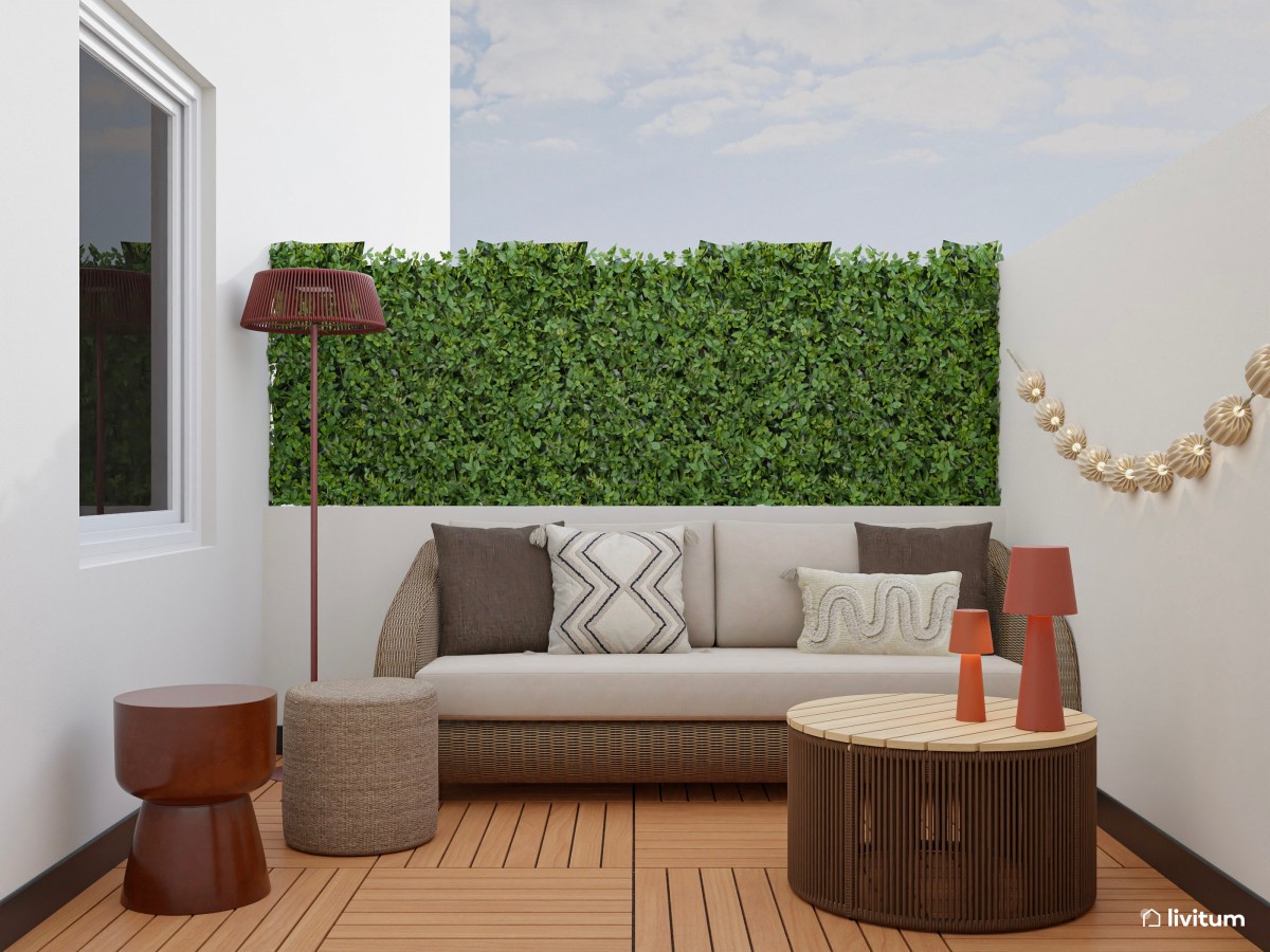 Terraza con acogedor salón exterior y jardín vertical