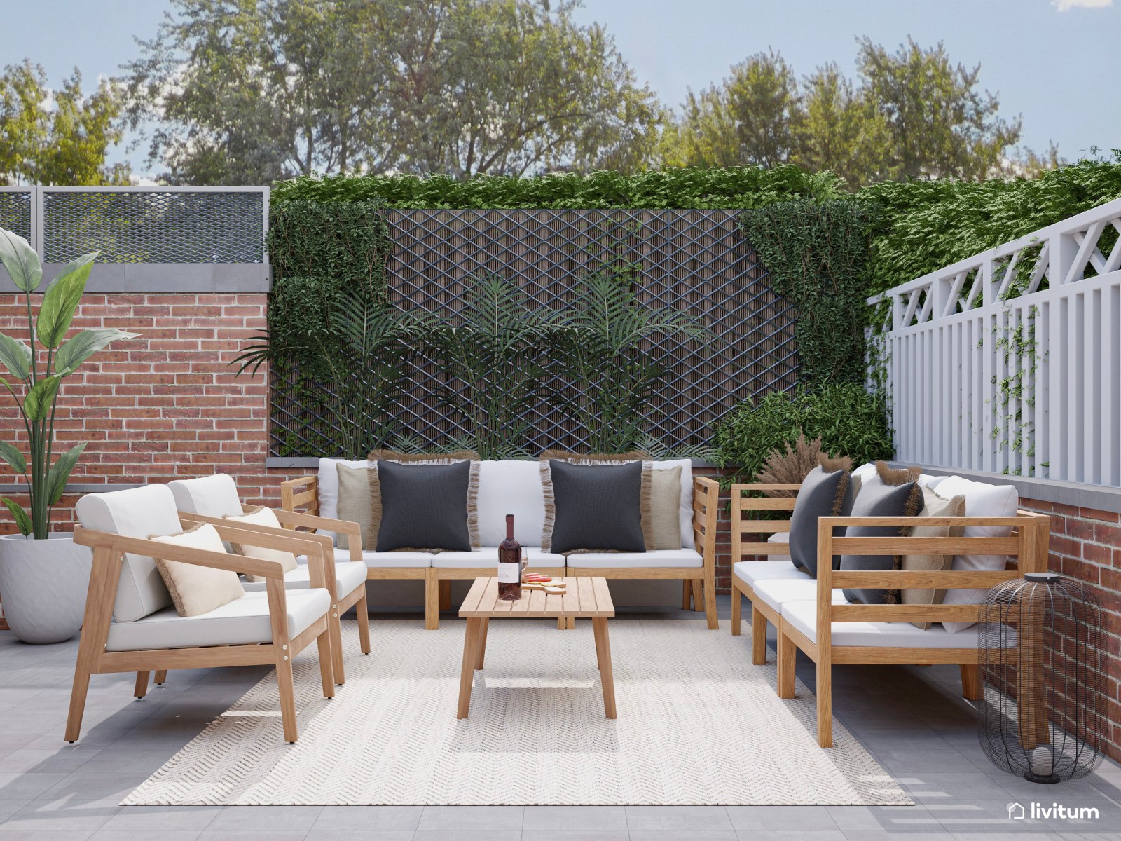 Terraza con amplia zona de sofás, comedor y barbacoa