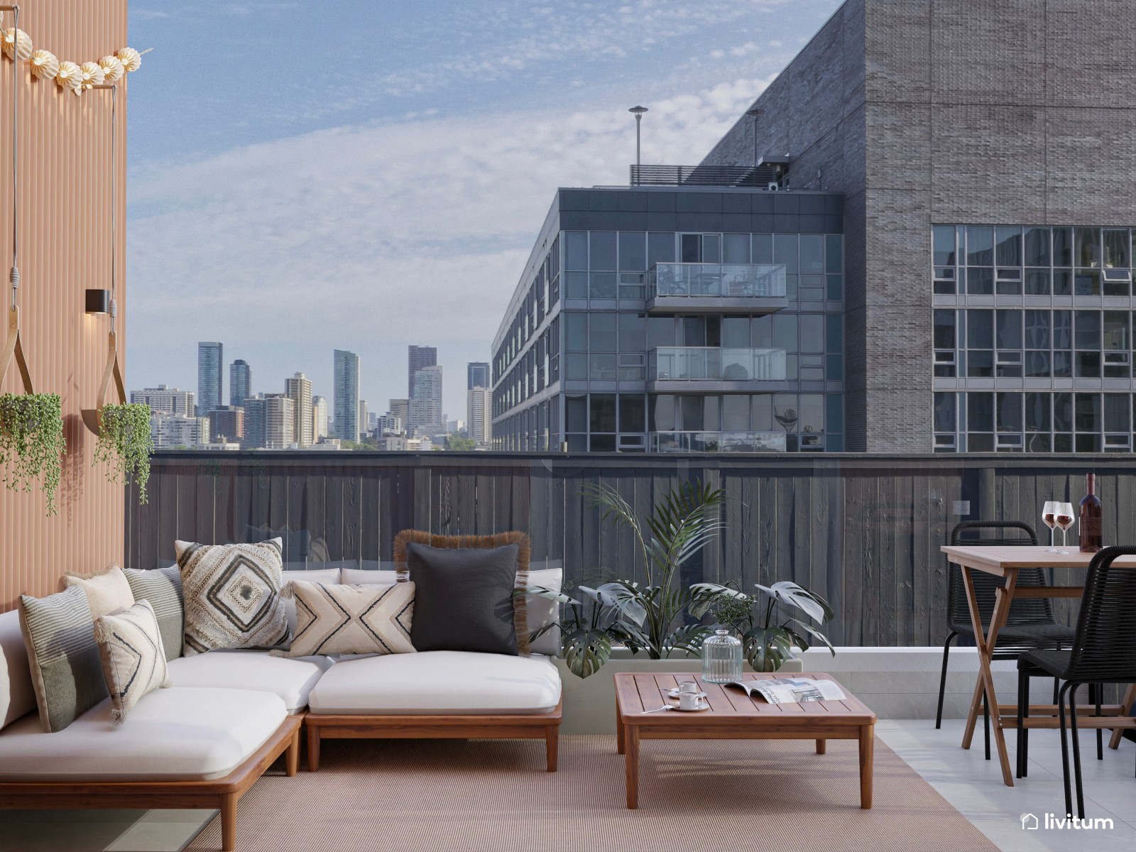 Terraza con zona de descanso y pequeño comedor