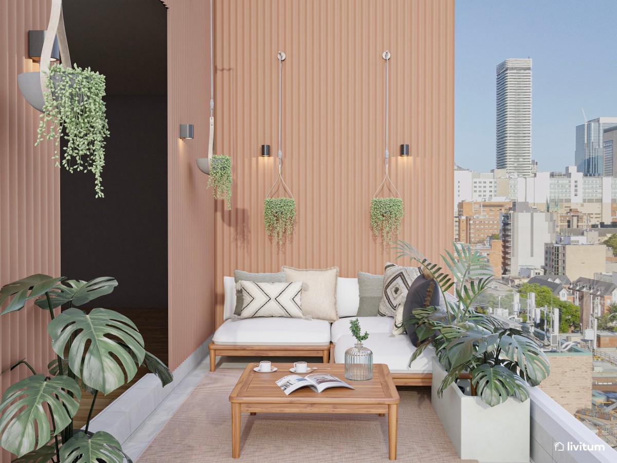Terraza con zona de descanso y pequeño comedor