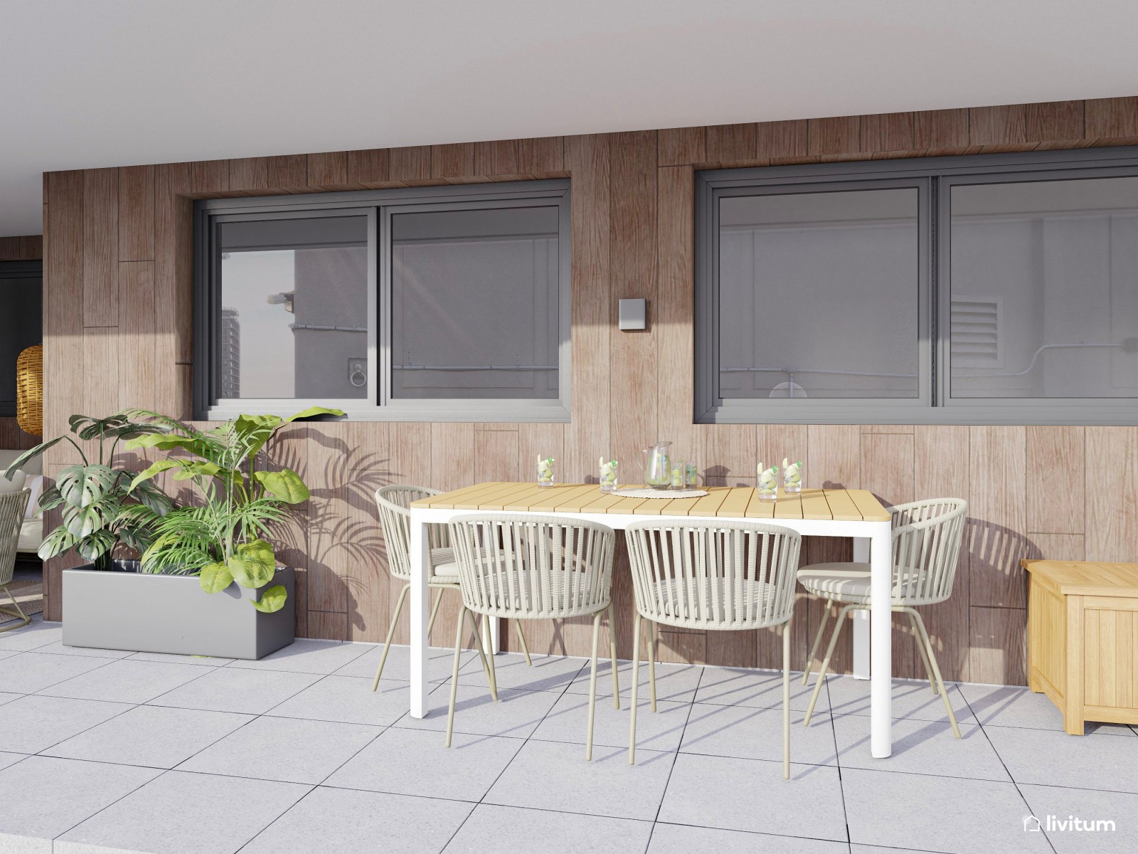 Terraza con zona de salón y comedor exterior