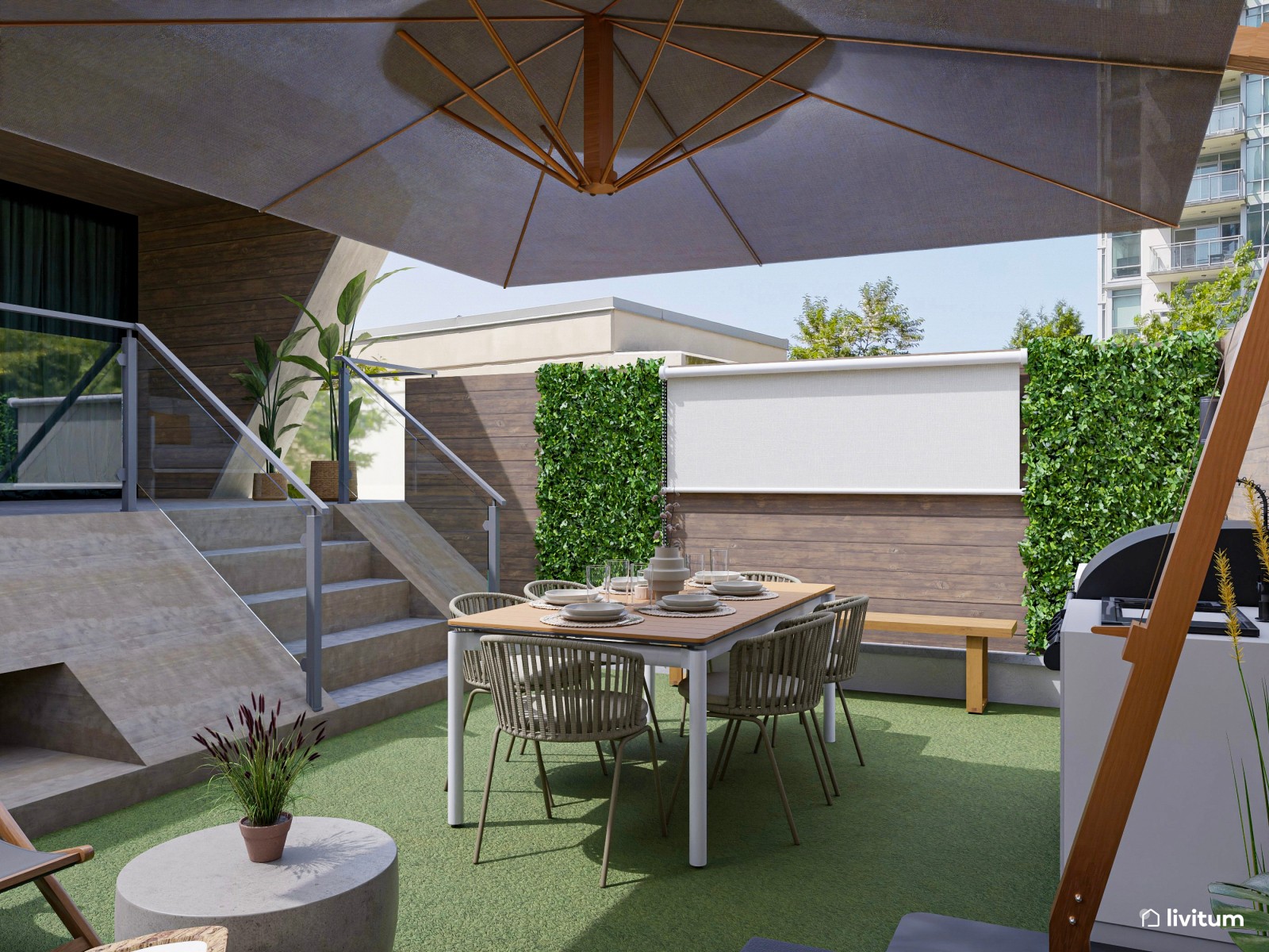 Terraza exterior con zona de barbacoa y dos zonas de descanso