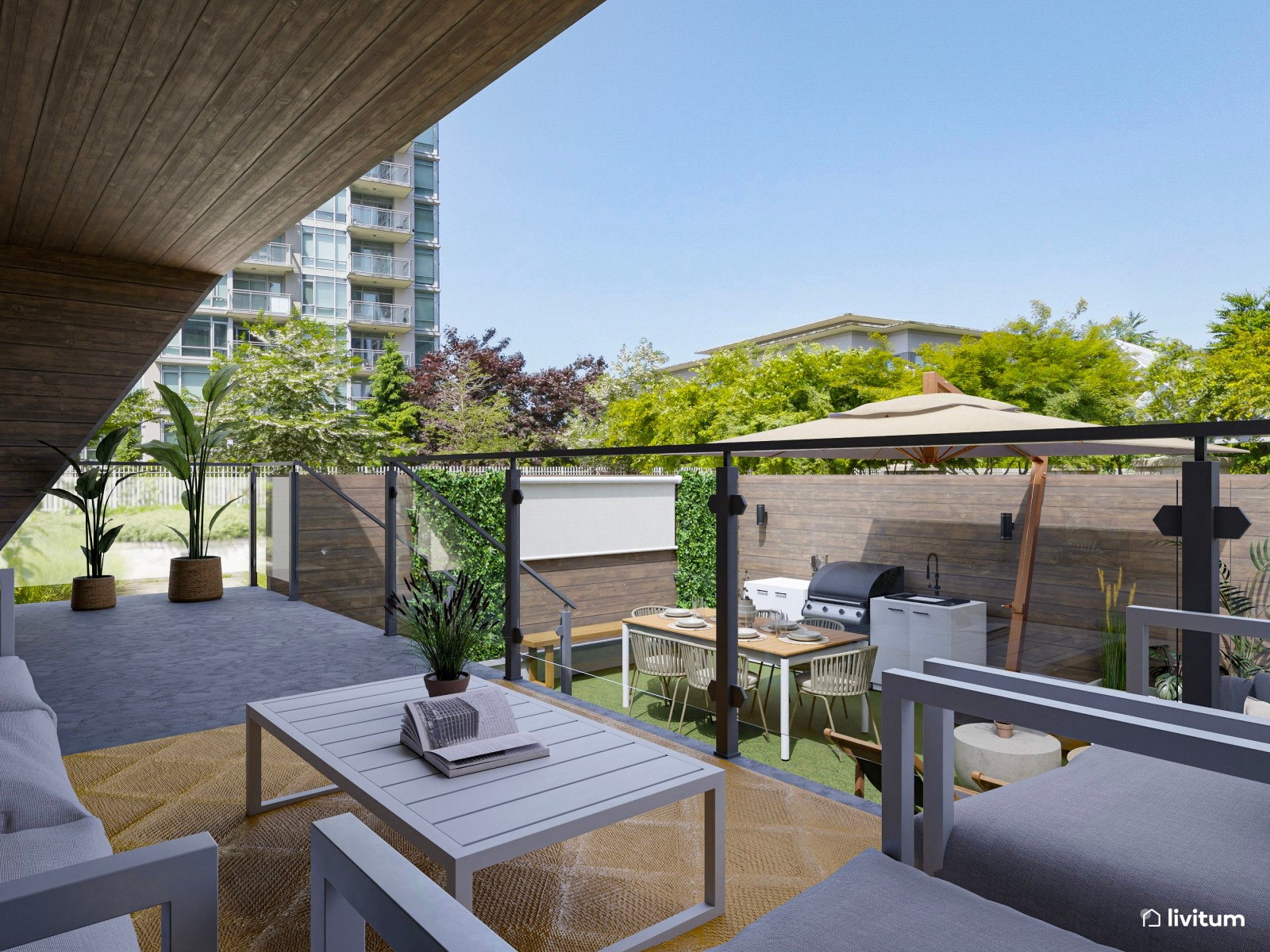 Terraza exterior con zona de barbacoa y dos zonas de descanso