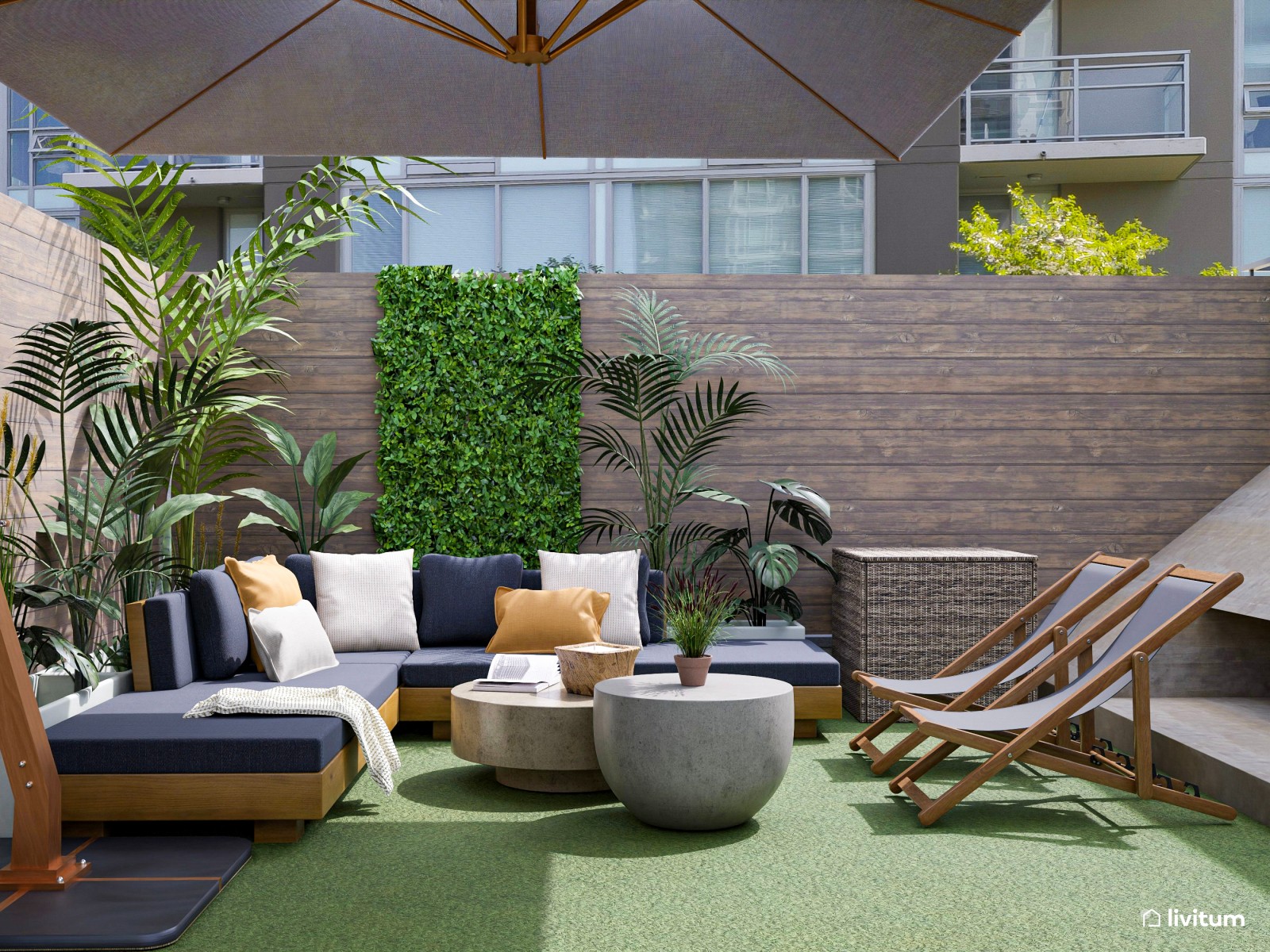 Terraza exterior con zona de barbacoa y dos zonas de descanso