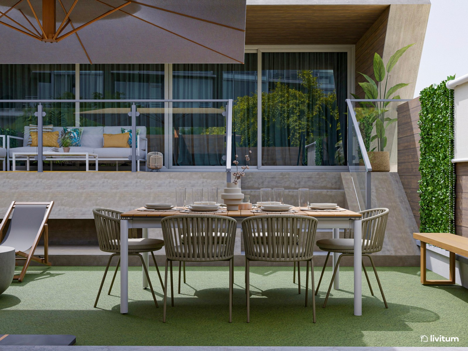 Terraza exterior con zona de barbacoa y dos zonas de descanso