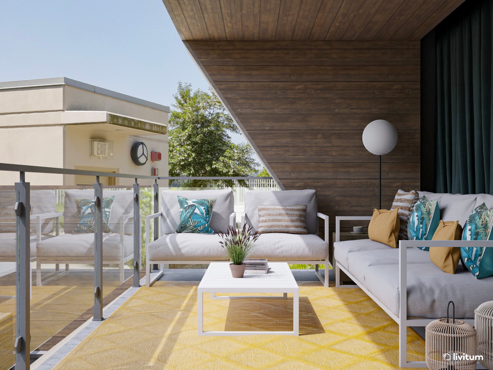 Terraza exterior con zona de barbacoa y dos zonas de descanso