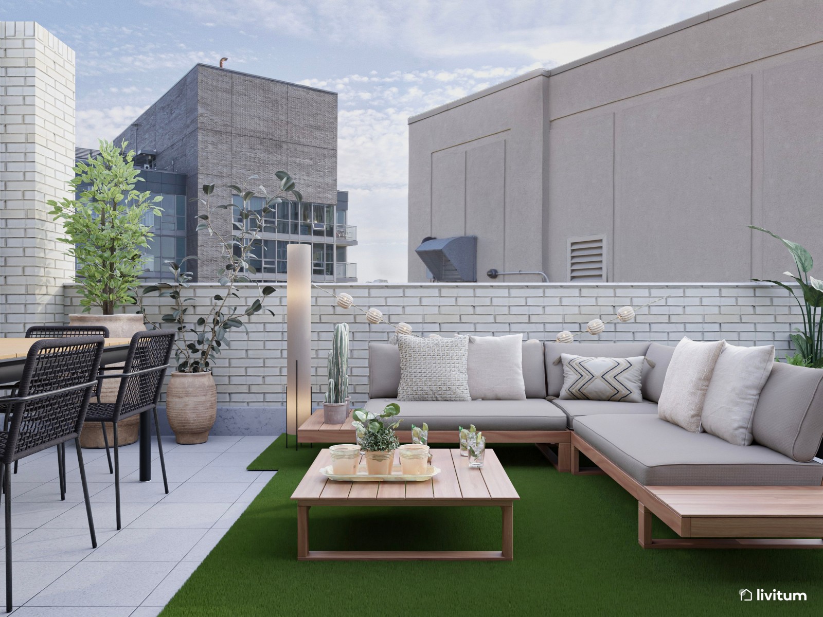 Terraza moderna con chill out en color gris y césped ornamental
